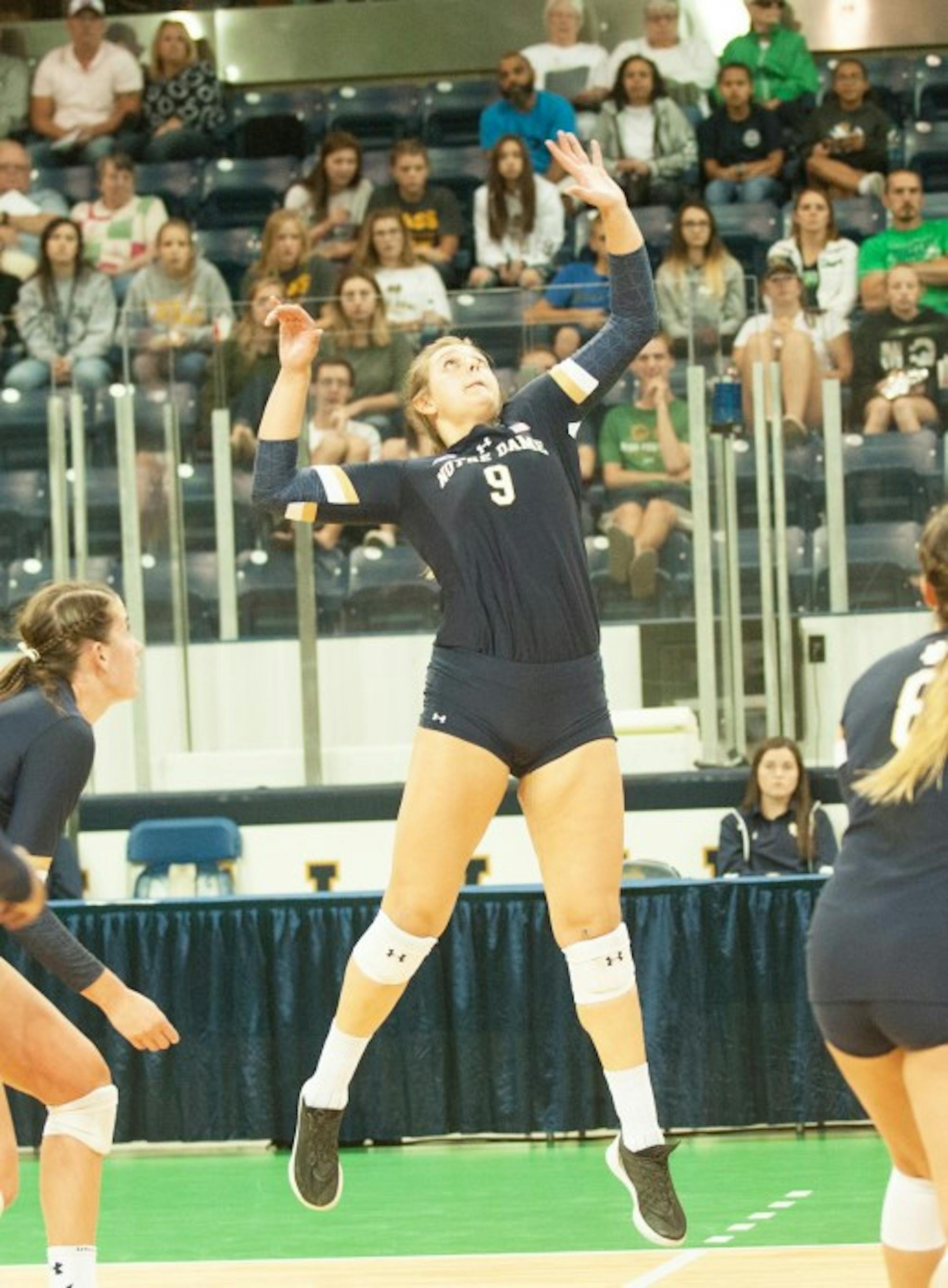 Irish junior outside hitter Rebecca Nunge goes up for the ball  during Notre Dame’s 3-1 win over Valparaiso on Aug. 25 at Compton Family Ice Arena.