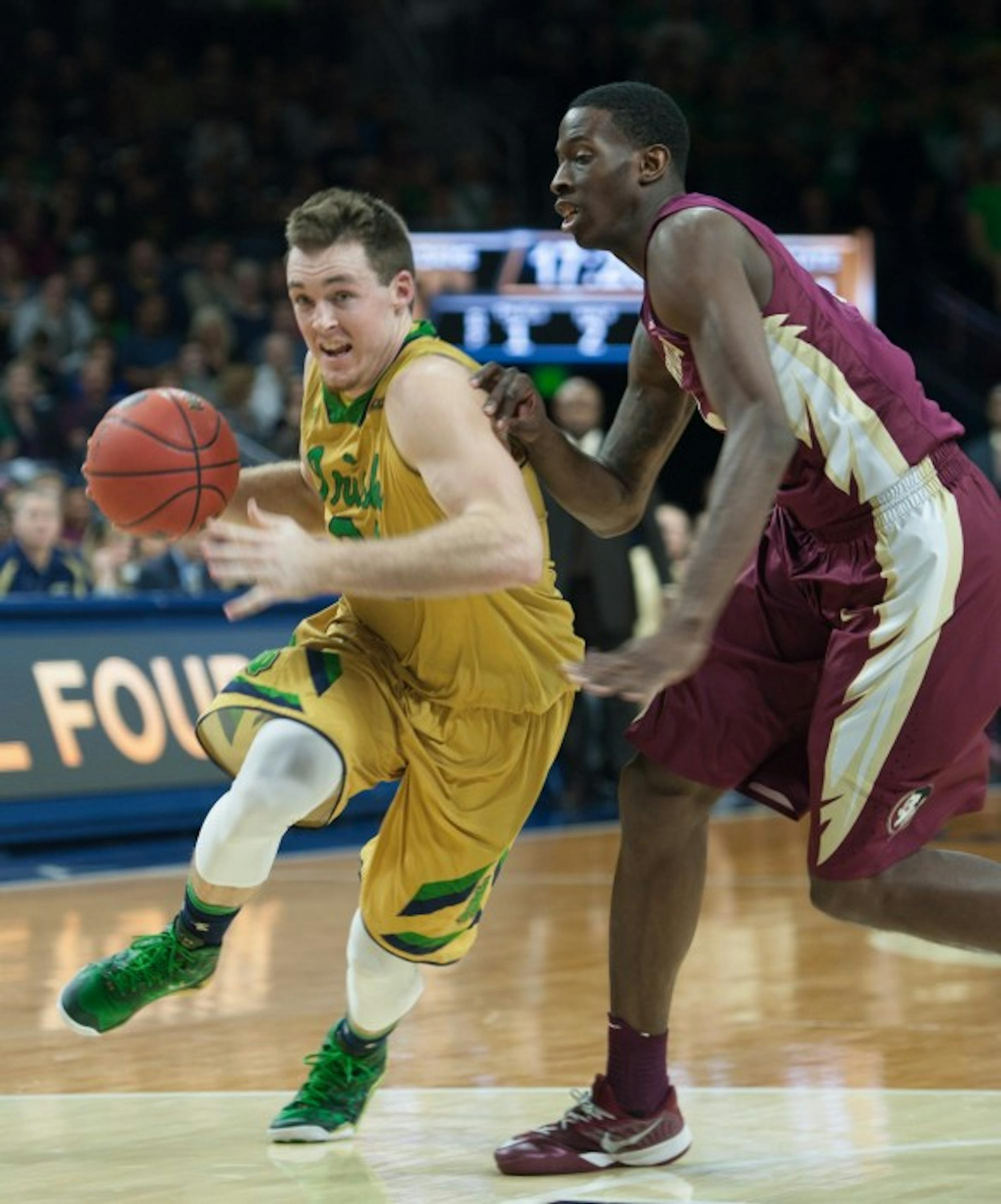 Irish senior guard Pat Connaughton drives into the lane against a Florida State defender in Notre Dame’s 83-63 win Dec. 13 at Purcell Pavilion.