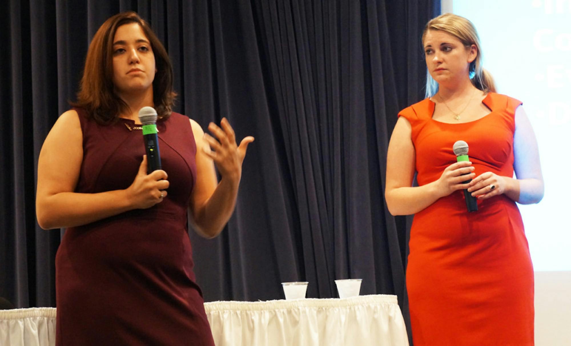 Sexual assault activists Andrea Pino, left, and Annie Clark, who were featured in “The Hunting Ground,” speak at a Sept. 11 event at Legends. The film explores ‘rape culture’ that students still try to understand and fight.