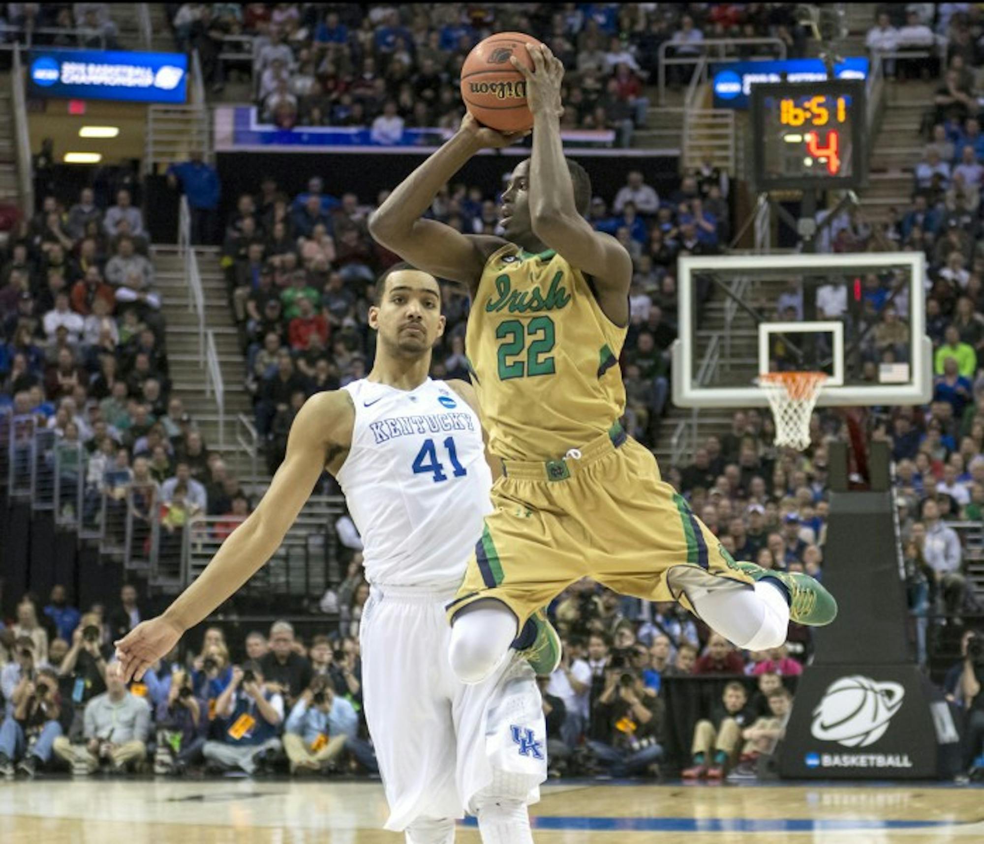 Irish senior guard Jerian Grant floats in the lane looking for a pass during Notre Dame’s 68-66 loss to   Kentucky during their Elite Eight matchup March 28.  Grant finished with 15 points and six assists.