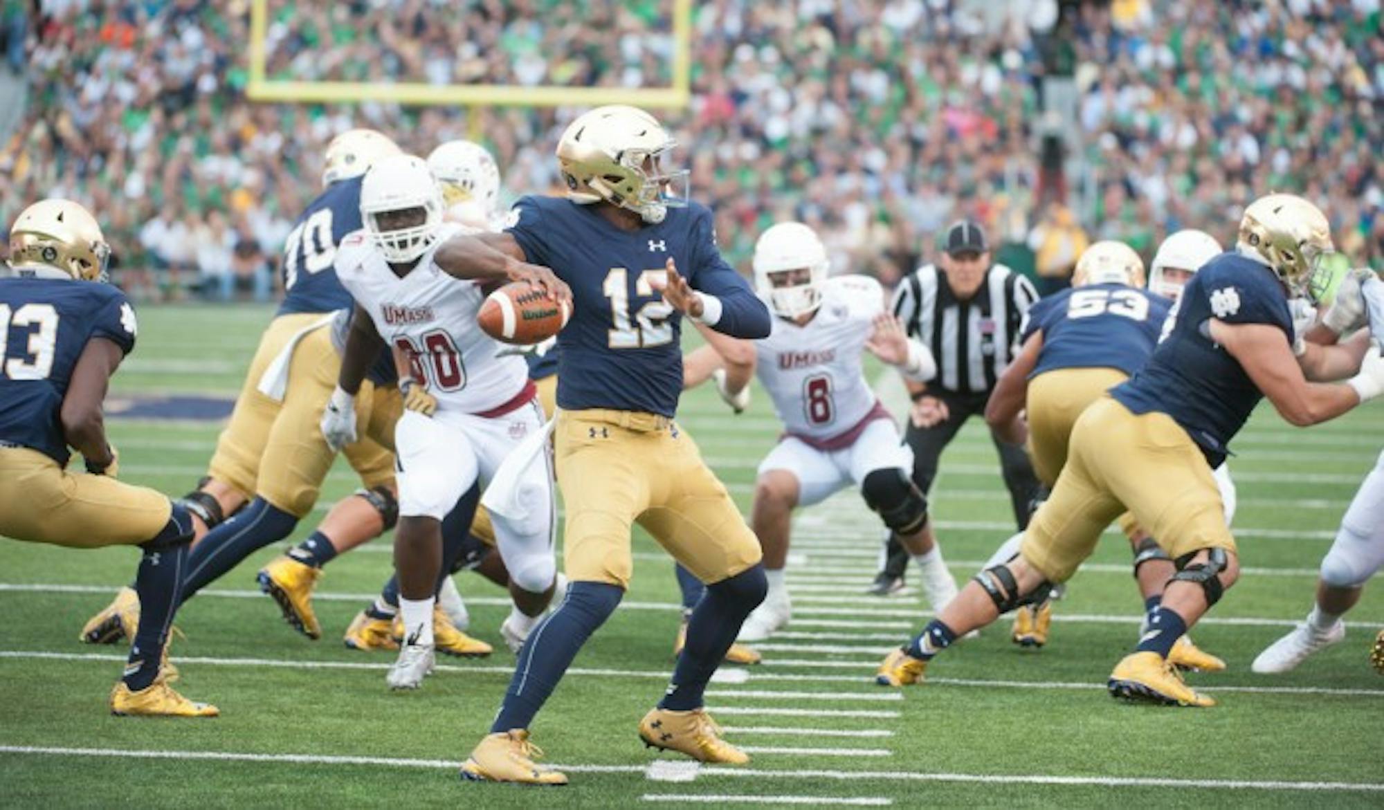 Irish junior quarterback Brandon Wimbush stares down his receiver and steps into a throw during Notre Dame’s 62-27 win over UMass on Sept. 26, 2015, at Notre Dame Stadium. Wimbush sat out the 2016 season as a redshirt, but now he stands to start at quarterback for the Irish in 2017 after last year’s starter, DeShone Kizer, declared for the NFL Draft.
