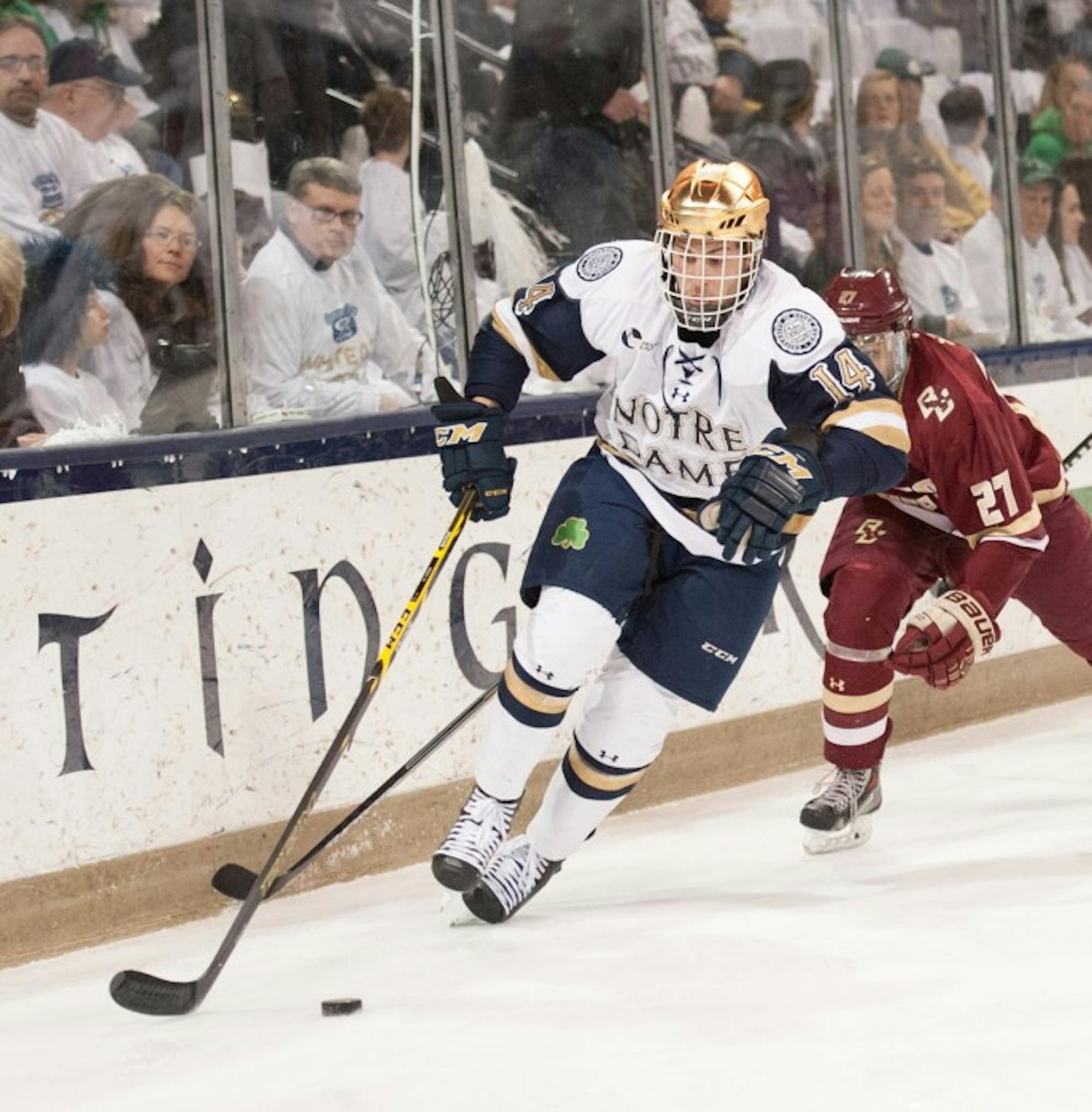 Senior center Thomas DiPauli skates along the boards during a 2-0 loss to Boston College on Feb. 28 at Purcell Pavilion. DiPauli totaled 8 goals and 21 assists last season.
