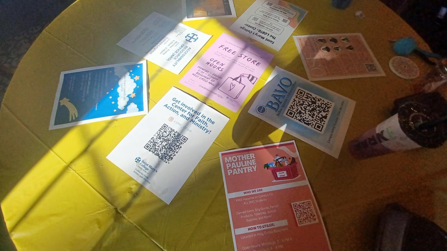 Flyers on tables for different campus resources.jpg