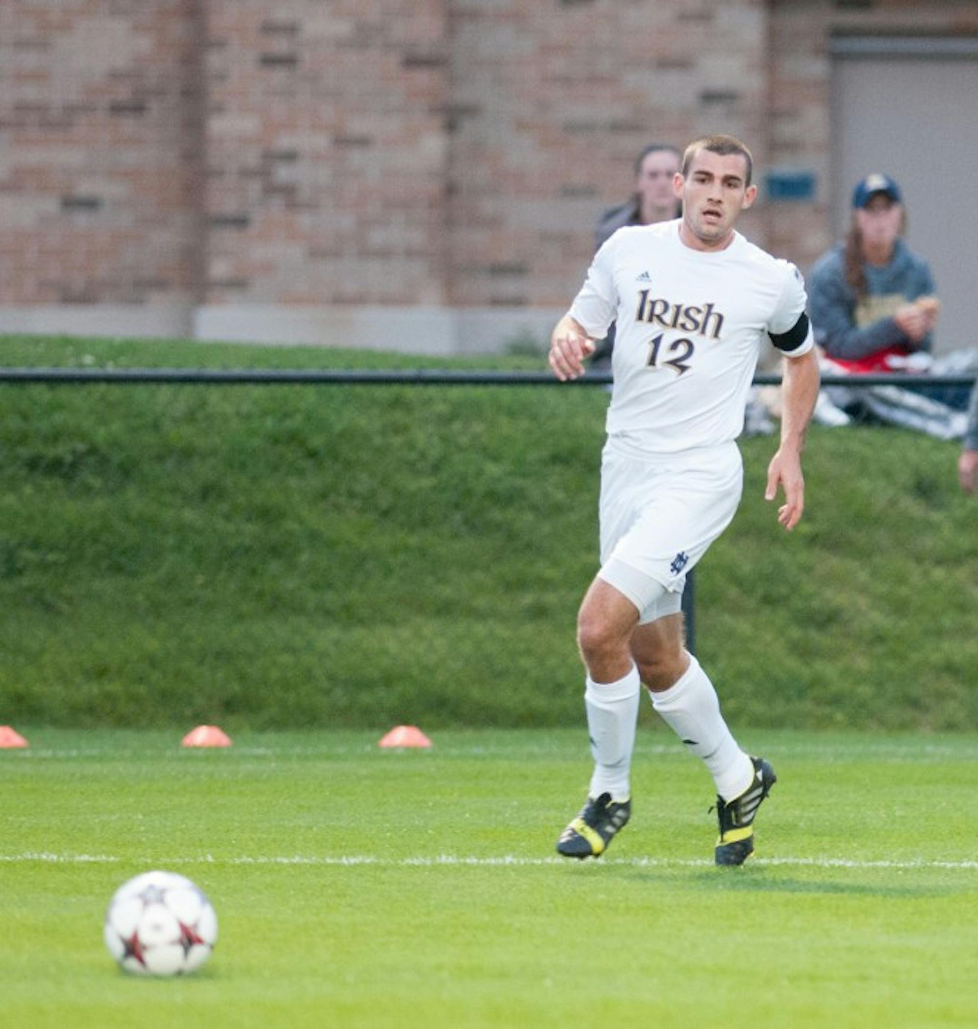 Irish graduate student defender Andrew O’Malley chases the ball during Notre Dame’s 3-0 victory over Michigan on Sept. 17 at Alumni Stadium.