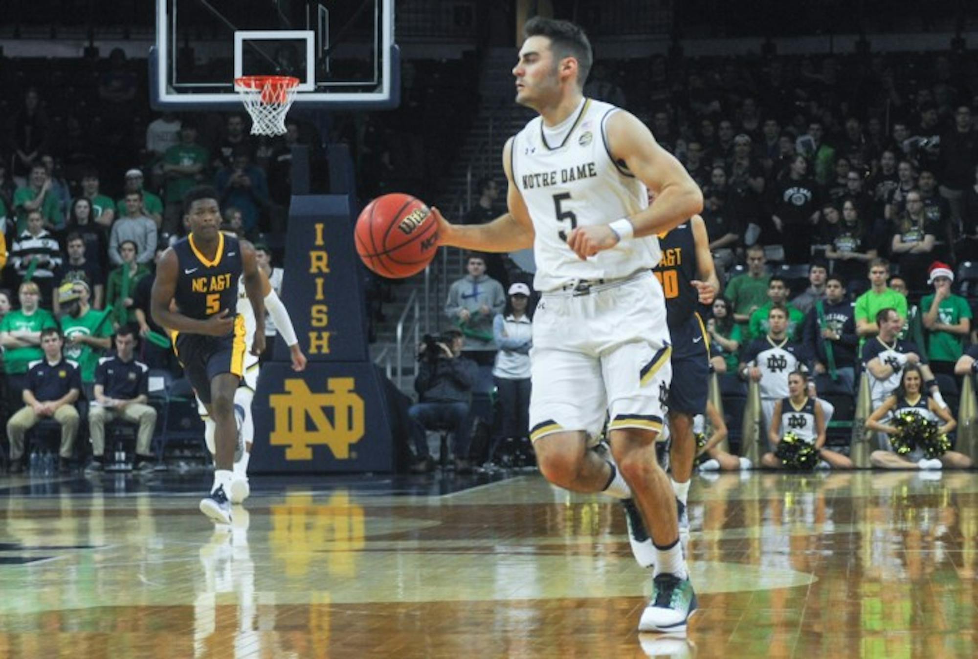Irish junior guard Matt Farrell brings the ball up the court during Notre Dame‘s 107-53 Dec. 4 win over North Carolina A&T at Purcell Pavilion.