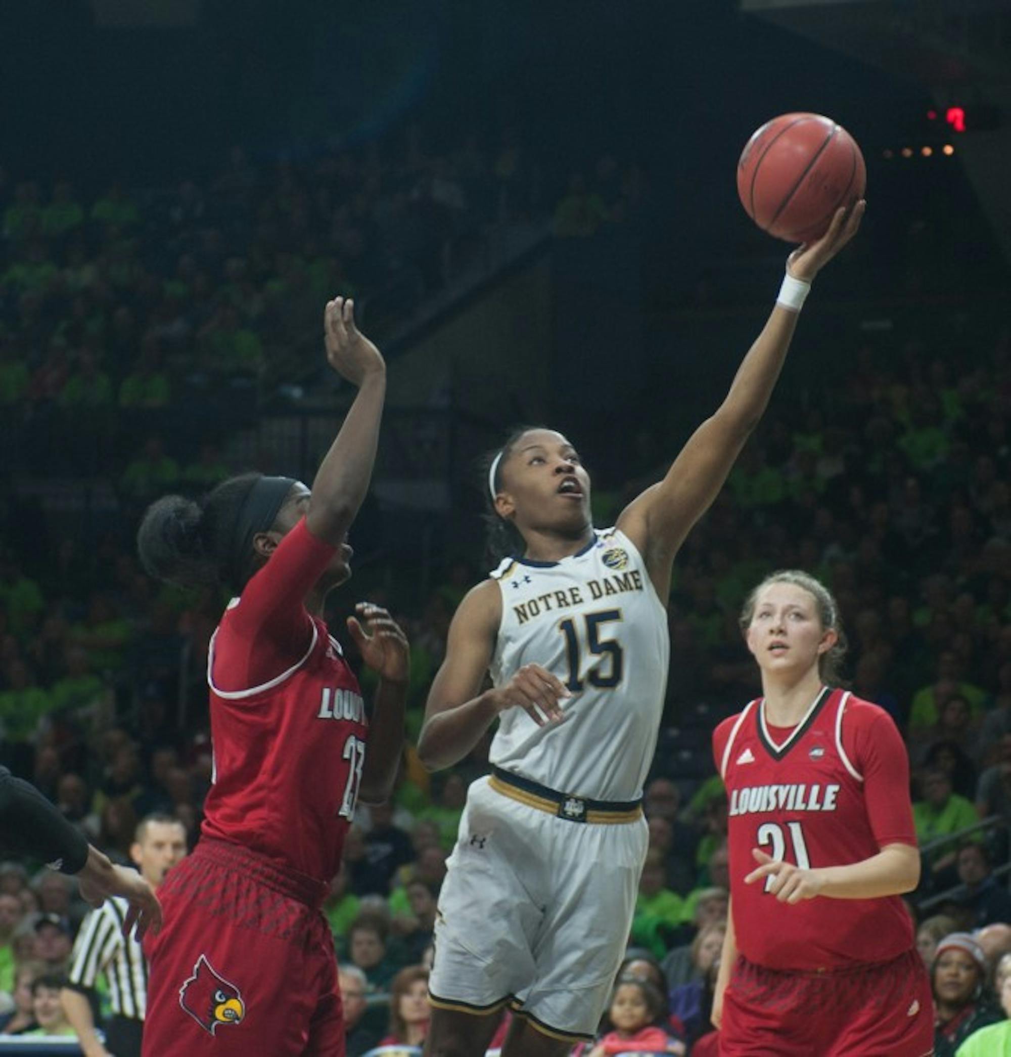 Irish senior guard Lindsay Allen goes up for a layup during Notre Dame’s 85-66 win over Louisville on Monday at Purcell Pavilion.