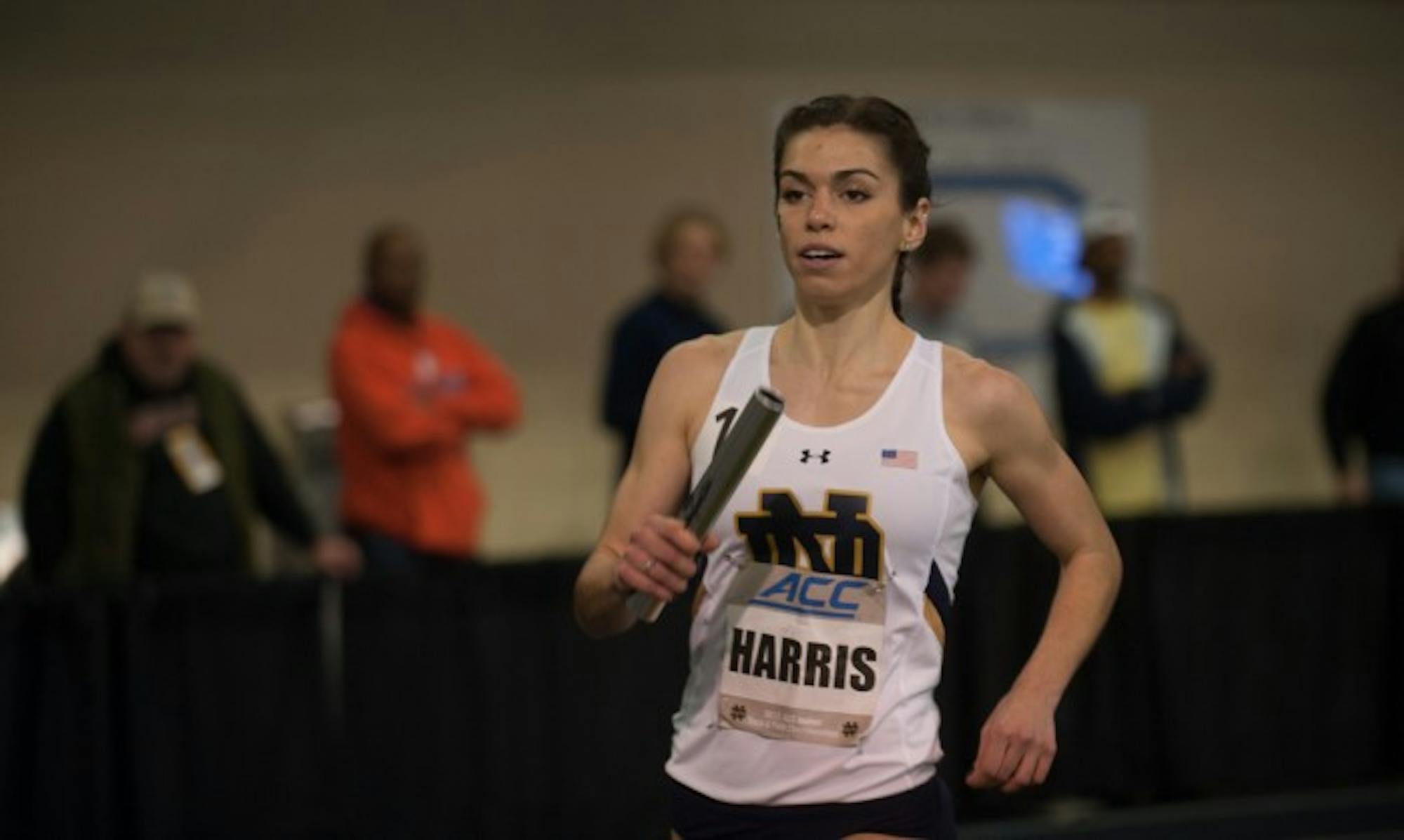 Irish junior Jessica Harris races in the distance medley relay during the ACC indoor championship on Feb. Feb. 23 at Loftus Sports Center.