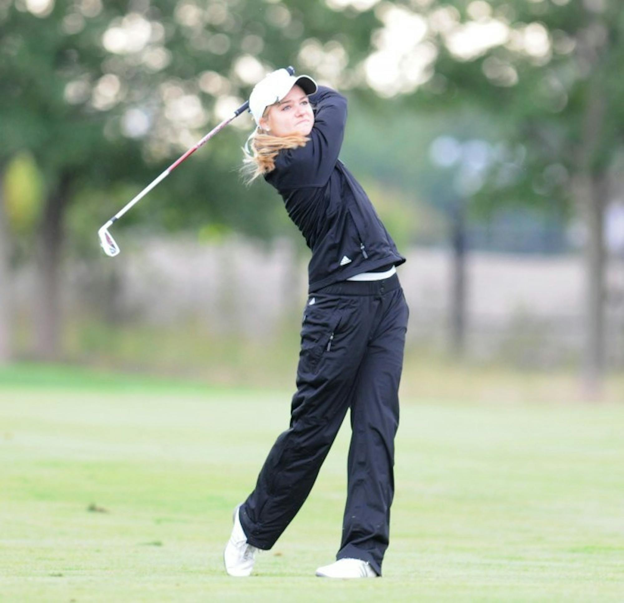 Belles sophomore Ali Mahoney hits a shot at the O'Brien National Invitational at Warren Golf Course on Sep. 15.