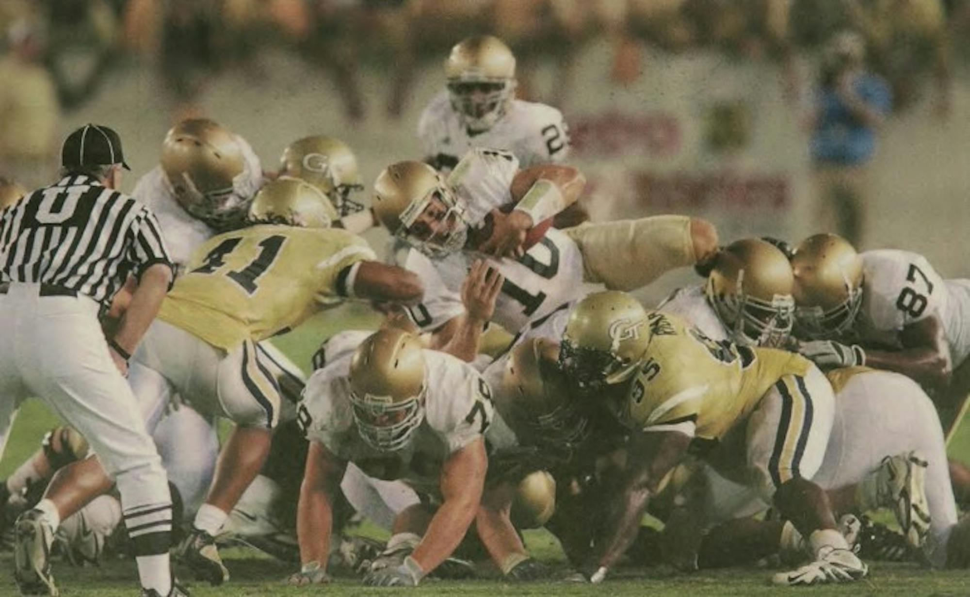 Former Irish quarterback Brady Quinn dives over the line in 14-10 victory over Georgia Tech on Sept. 2, 2006. Now he works to help veterans and their families throughout the country.