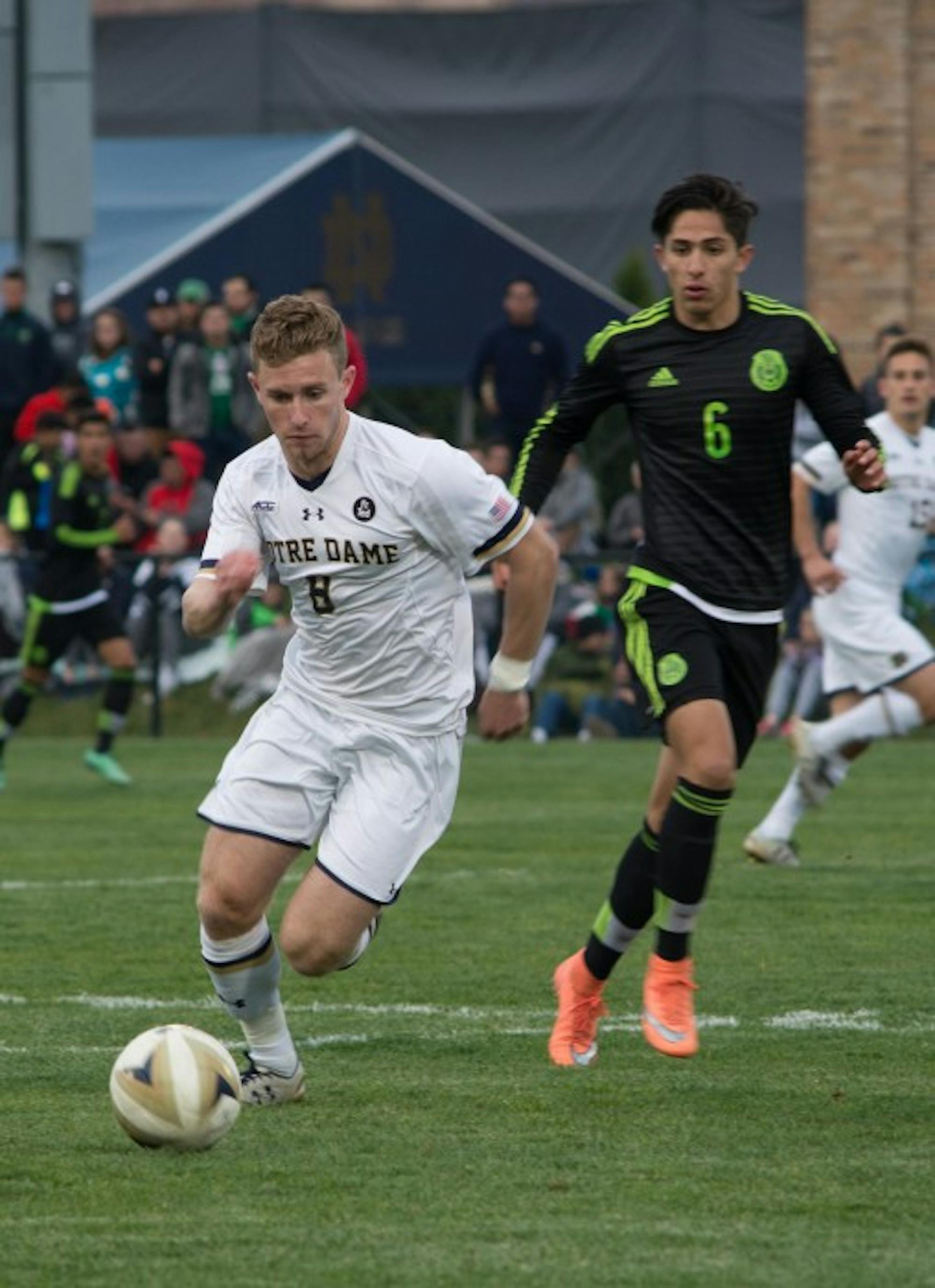 Freshman forward Jon Gallagher dribbles the ball during Notre Dame’s 2-1 loss to the Mexican U-20 national team on Friday.