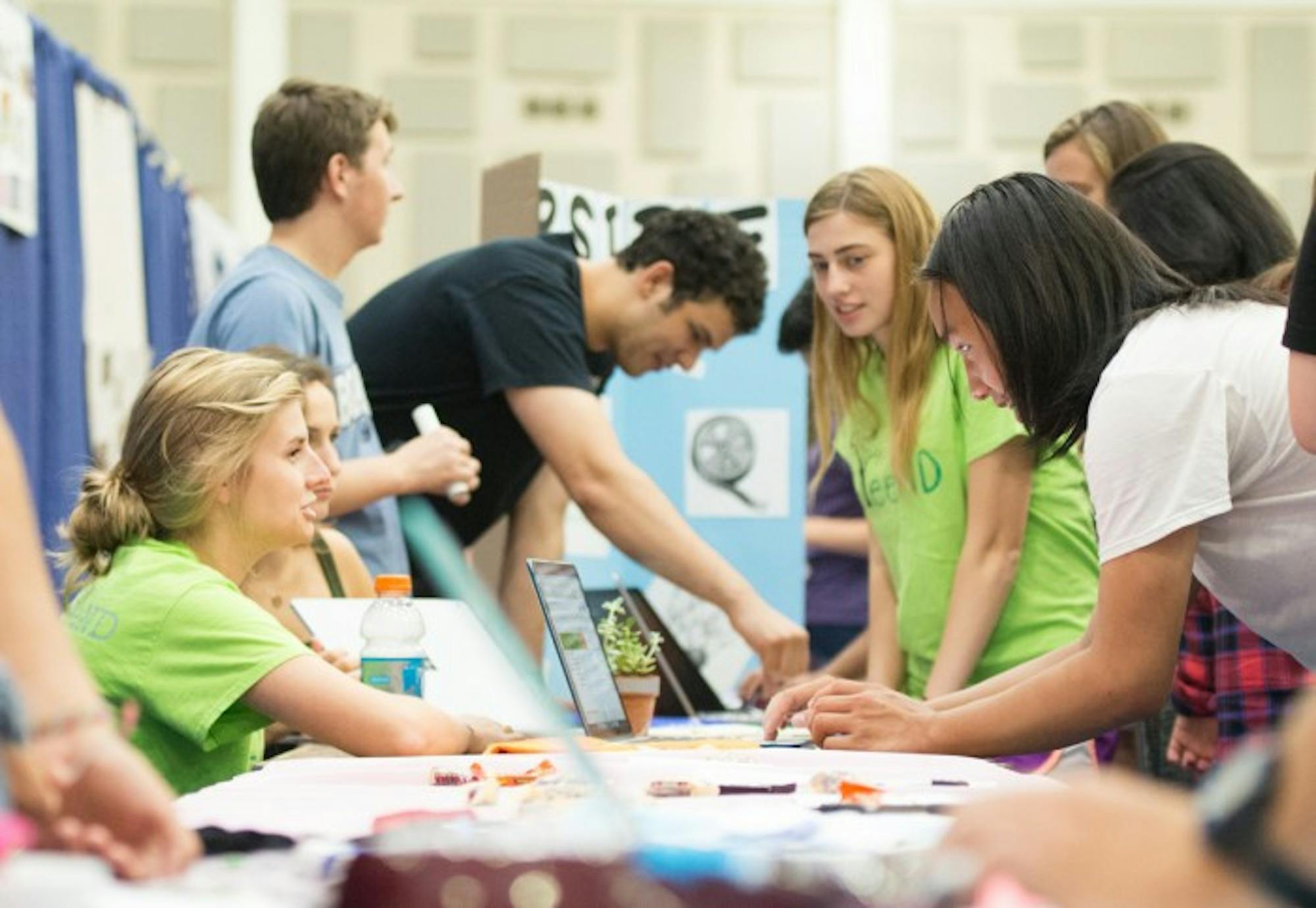 Members of GreeND recruit students at Tuesday's Activities night in the Joyce Center. Nearly 350 organizations had tables at the event, which was meant to help new students involved on campus.