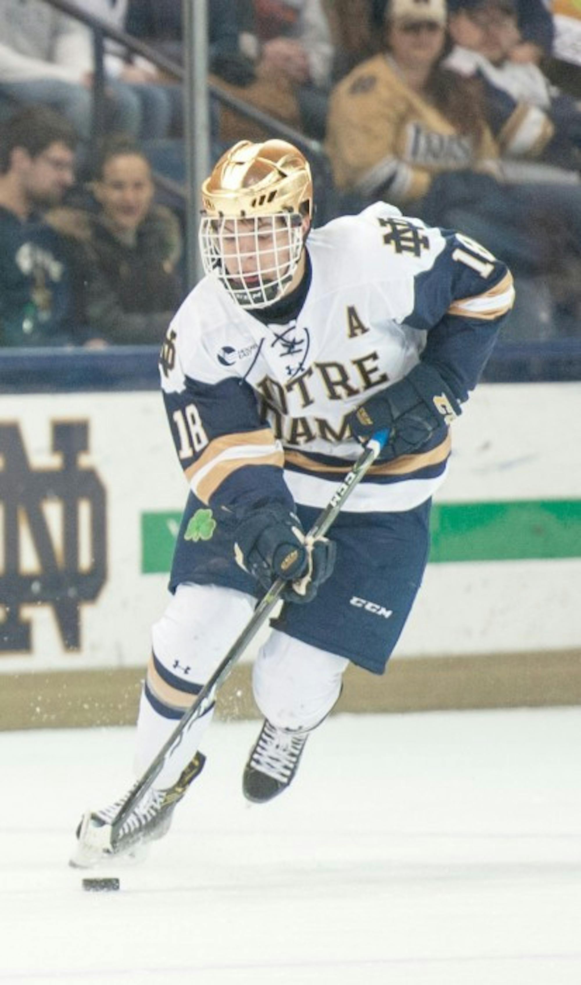 Irish junior forward Jake Evans breaks out during Notre Dame’s 5-2 victory over Providence in Game 1 of the Hockey East quarterfinals.