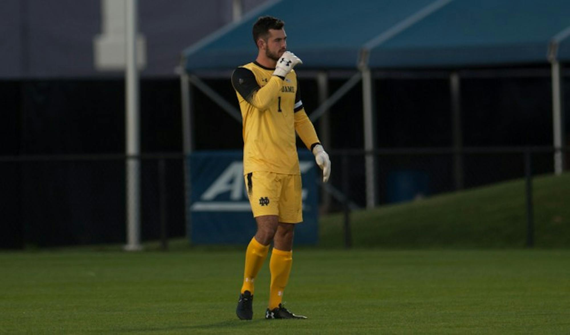 Irish graduate student goalkeeper Chris Hubbard surveys the field during Notre Dame’s 3-0 win over North Carolina State on Sept. 15 at Alumni Stadium. Hubbard has 18 saves in seven games for the Irish this season, including five saves during Friday’s loss to Virginia Tech.