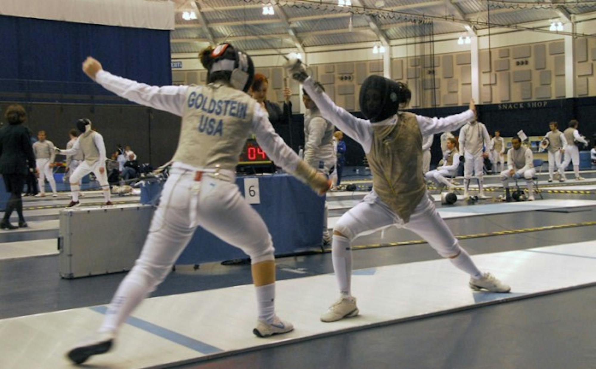 Irish sophomore Lee Kiefer takes on Northwestern sophomore Mikela Goldstein during the Notre Dame Duals on Feb. 23, 2013. This past weekend, Kiefer, Notre Dame's reigning National Champion, went undefeated in pool play before she tied for third in the Women's Foil during the NAC Division I Juniors Tournament.