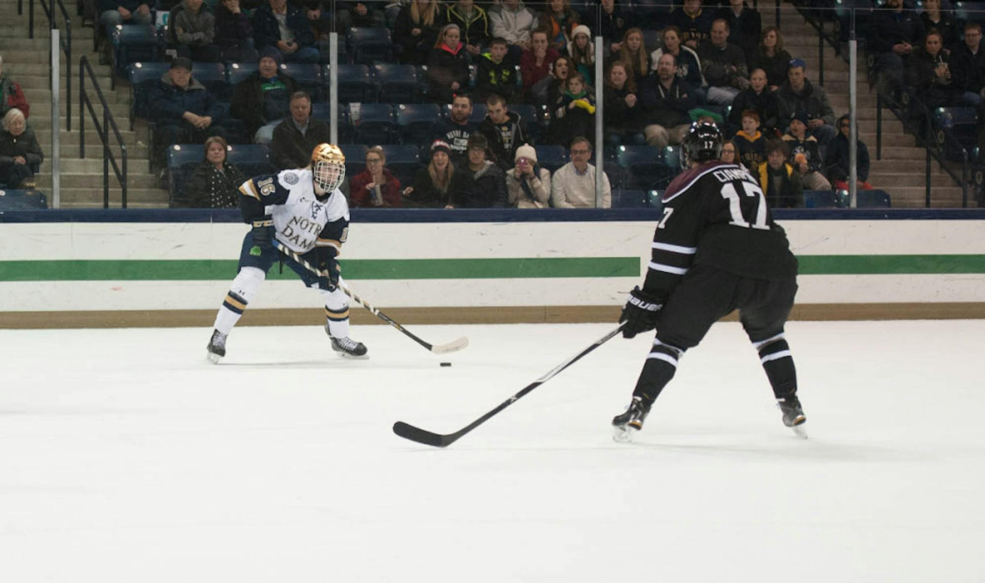 Irish freshman center Connor Hurley looks to pass to a teammate during Notre Dame’s 3-2 overtime loss to Union College on Nov. 28 at Compton Family Ice Arena. Hurley has three goals and seven assists this year.