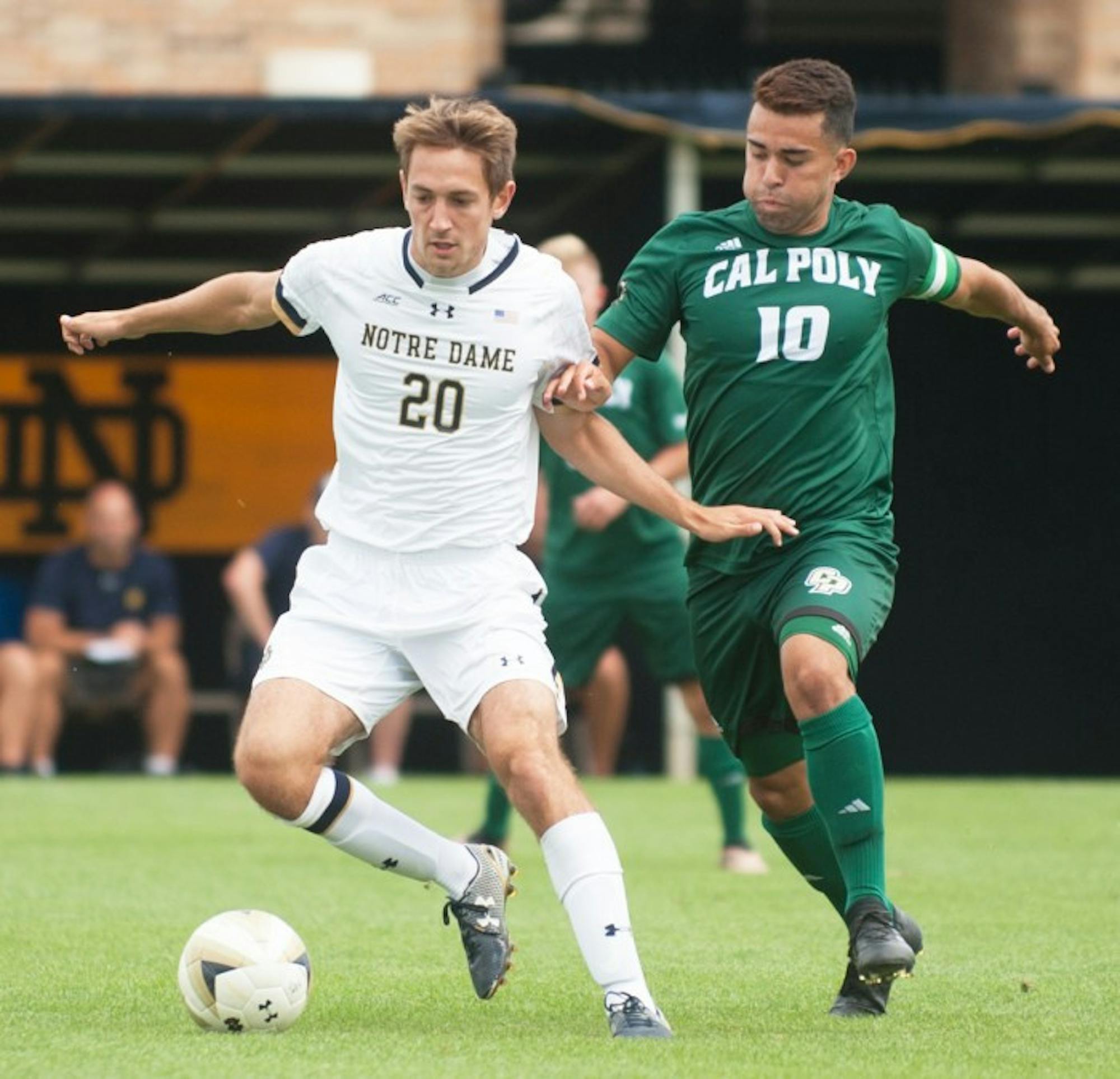 Irish senior midfielder Blake Townes dribbles around the defense during Notre Dame’s 2-1 double overtime victory over Cal Poly on Aug. 27 at Alumni Stadium.