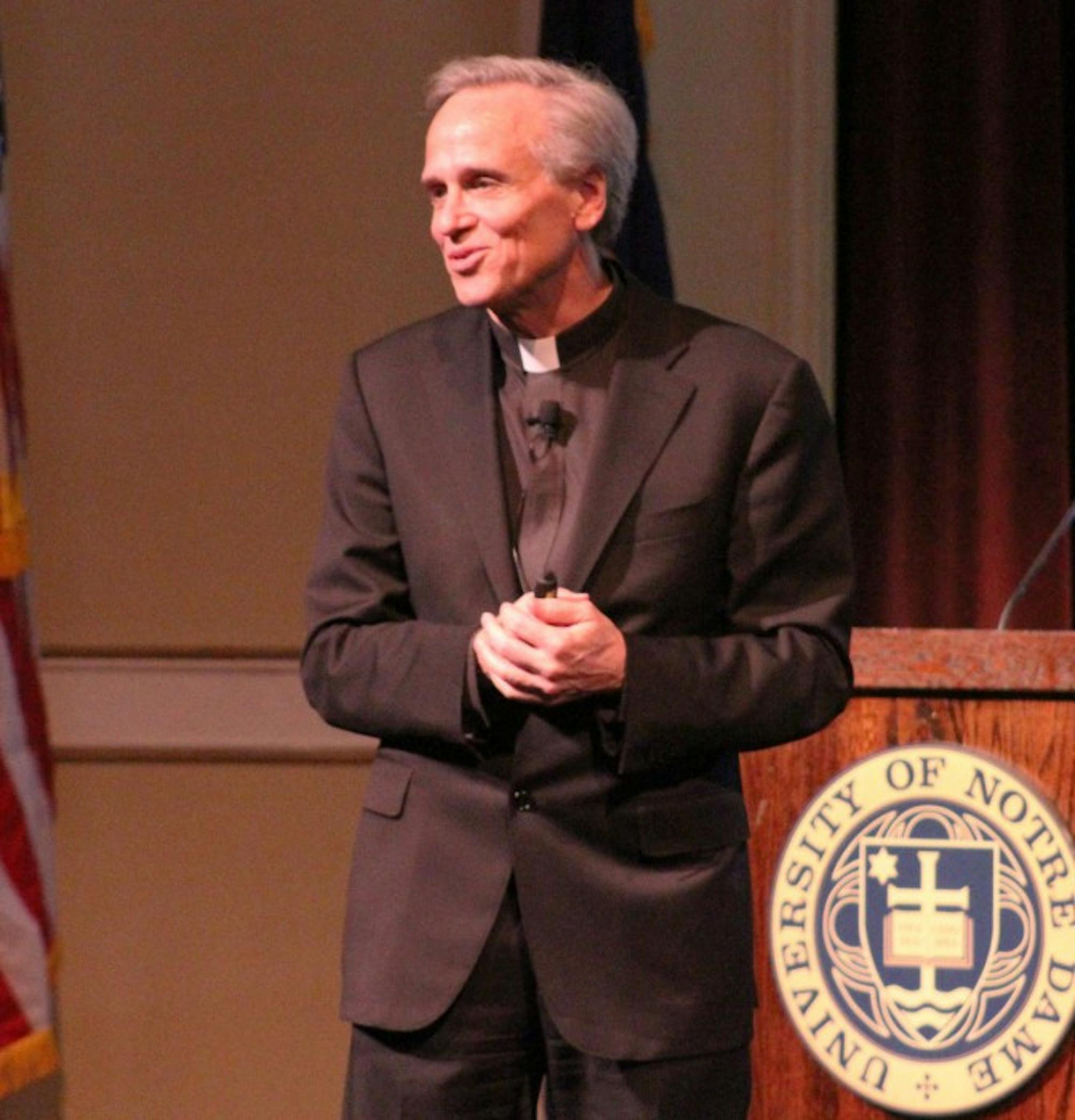 University President Fr. John Jenkins addresses members of the Notre Dame community at the fall town hall meeting Wednesday afternoon in Washington Hall.