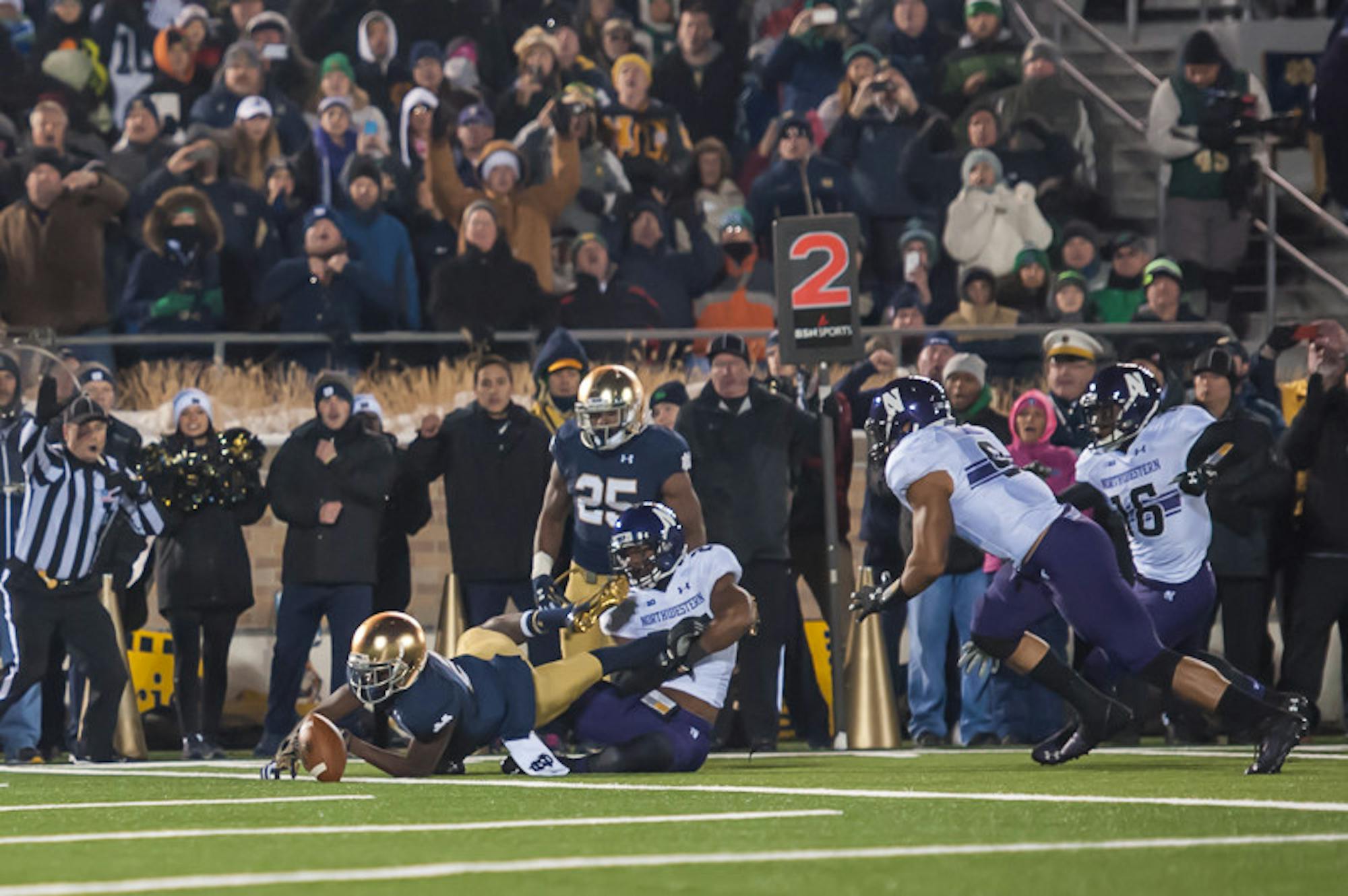 Irish junior receiver Chris Brown coughs up a fumble near the goal line during Notre Dame’s 43-40 overtime loss to Northwestern on Saturday at Notre Dame Stadium.
