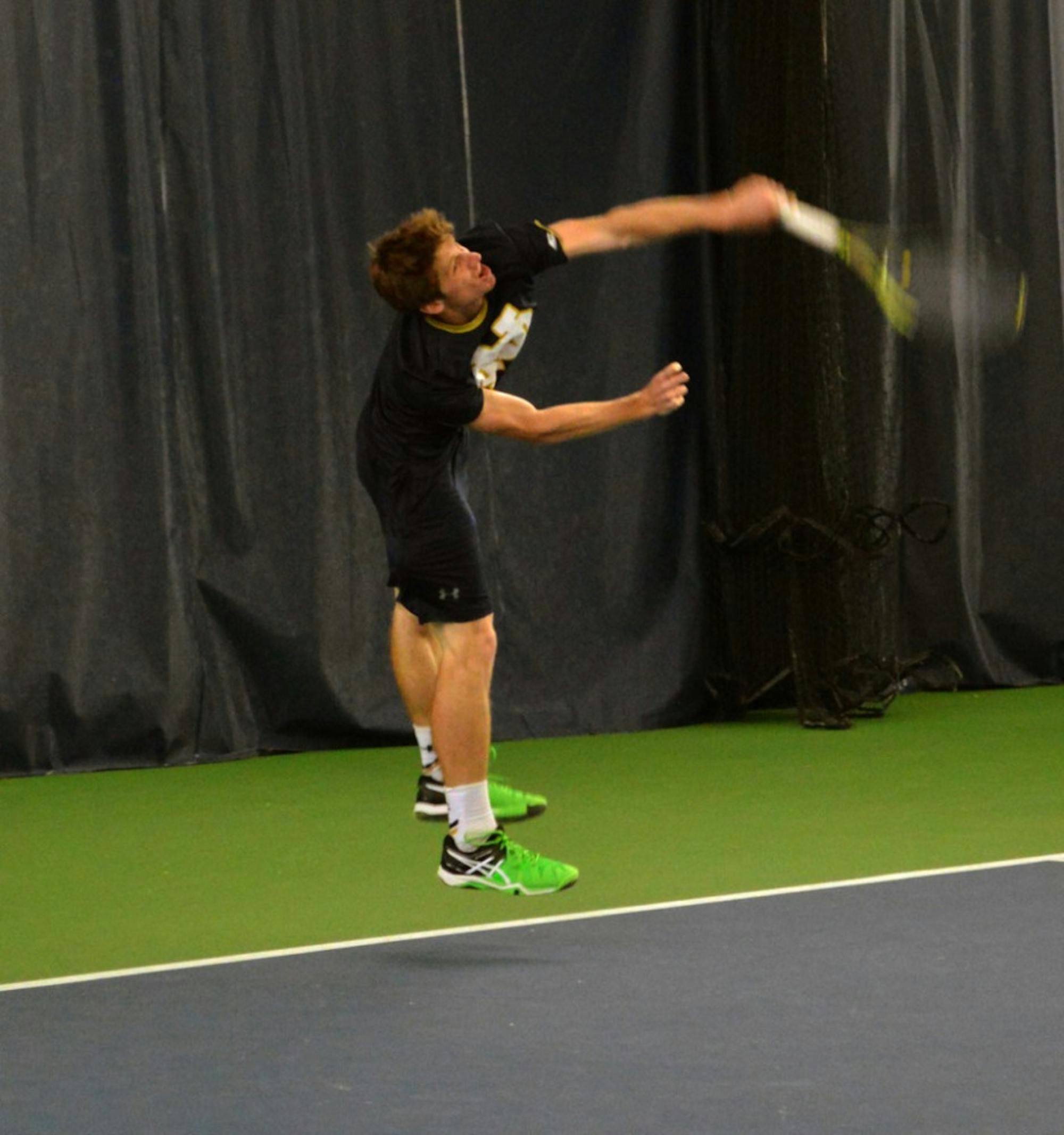 Irish senior Alex Lawson serves during Notre Dame’s 5-2 victory over Duke at Eck Tennis Pavilion on March 18. Lawson held a 13-16 record overall and a 5-6 record in the ACC for the 2015-2016 season.