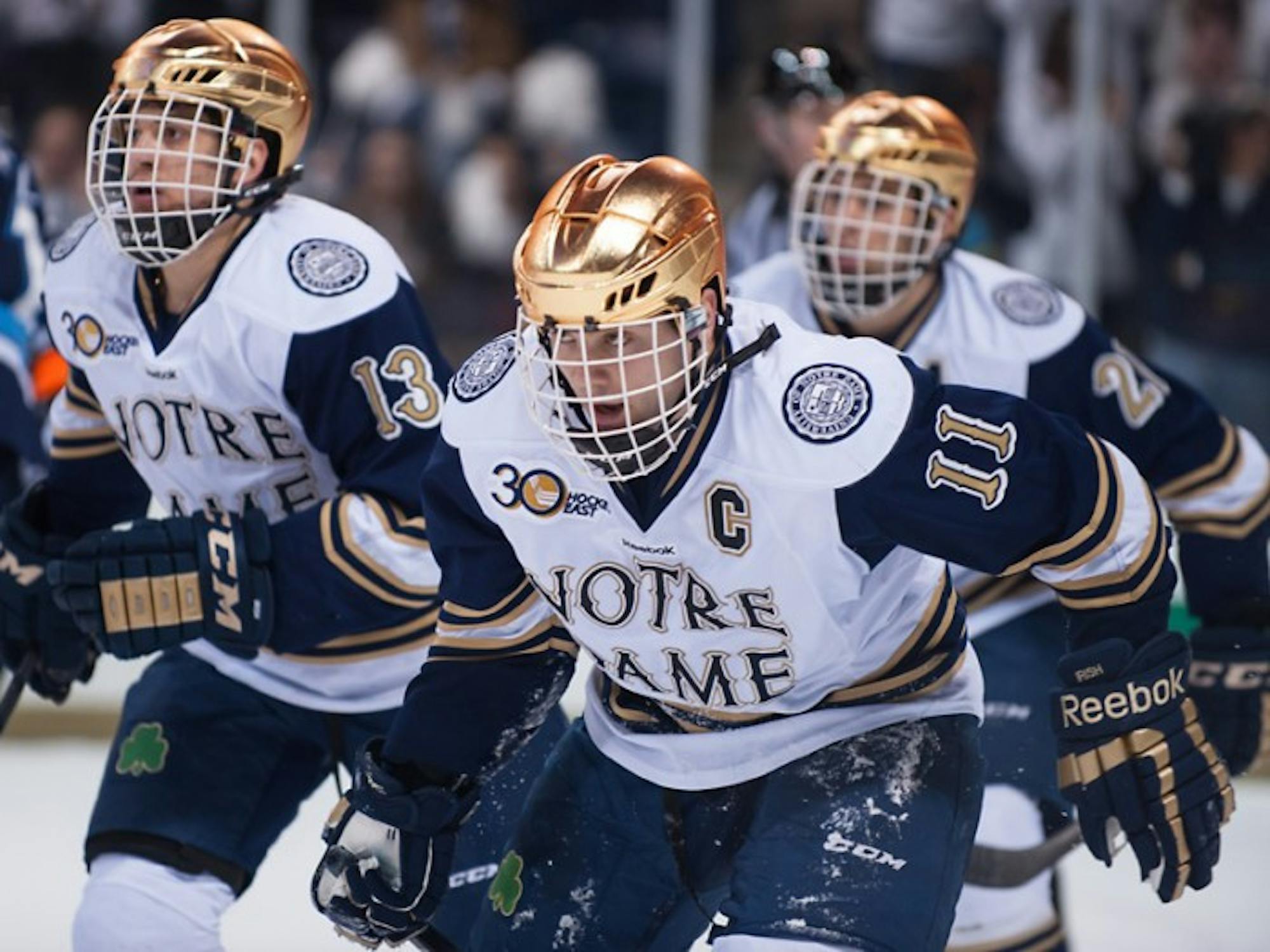 Irish senior left wing Jeff Costello skates ahead in Notre Dame’s 2-1 loss to Maine on Feb. 2. The captain scored a goal against Boston University on Saturday.