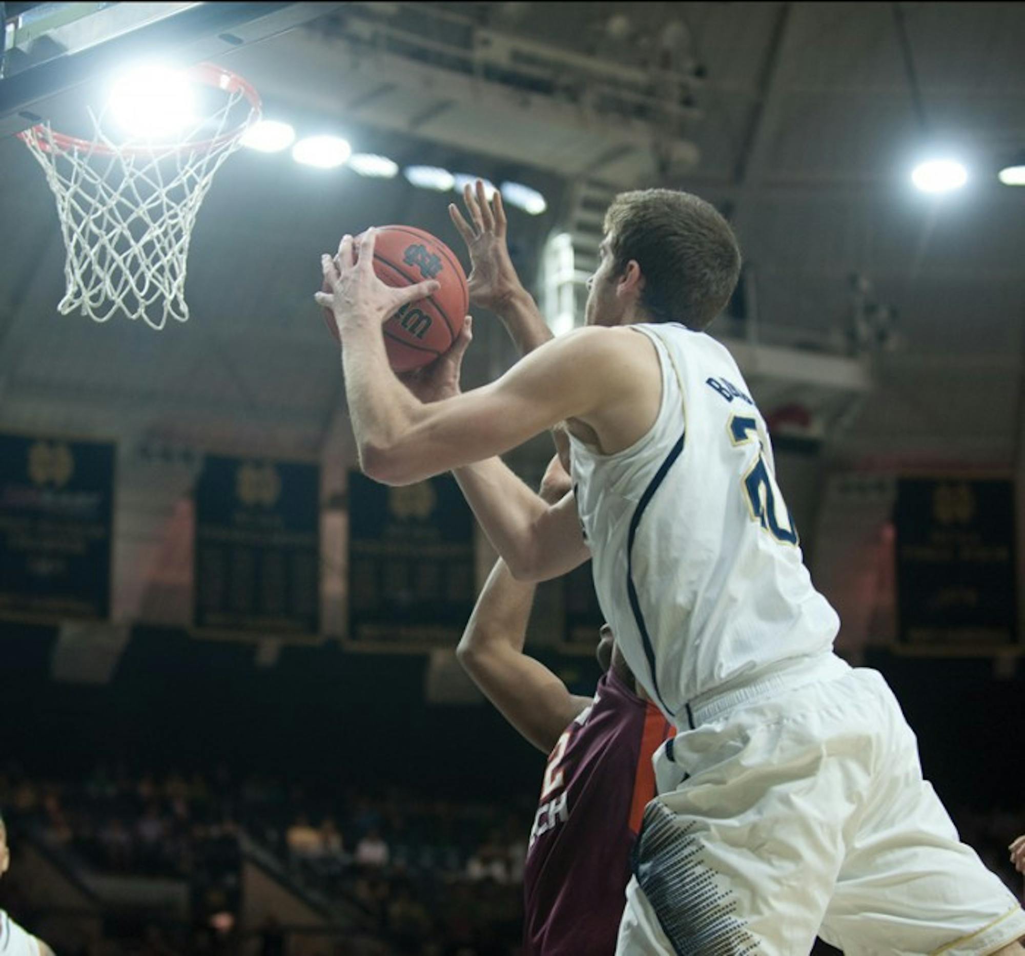Irish sophomore forward Austin Burgett goes up for a shot during Notre Dame's 70-63 win over Virginia Tech on Jan. 19.