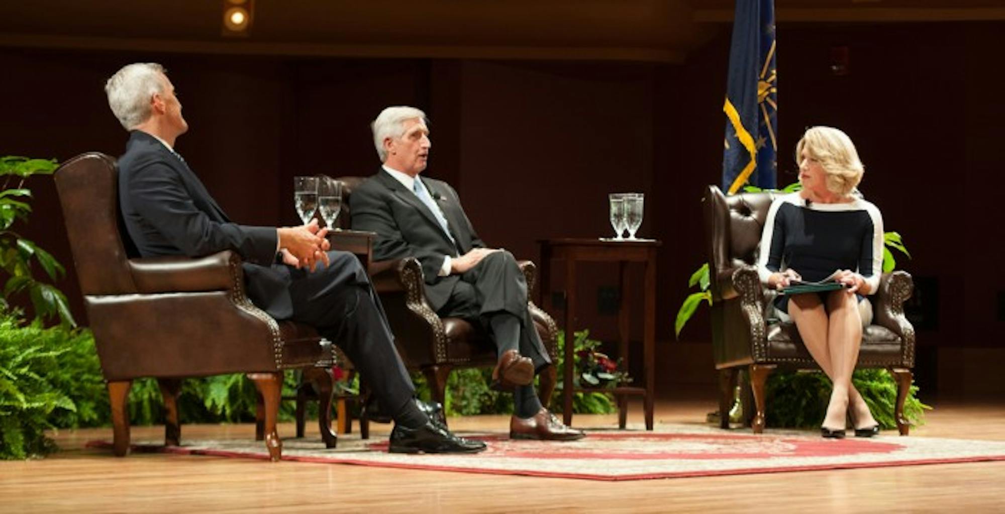 Former White House chiefs of staff Denis McDonough, left, and Andrew Card, right, speak at a lecture Wednesday night in DeBartolo Performing Arts Center. The two discussed presidential decision making and American foreign policy.