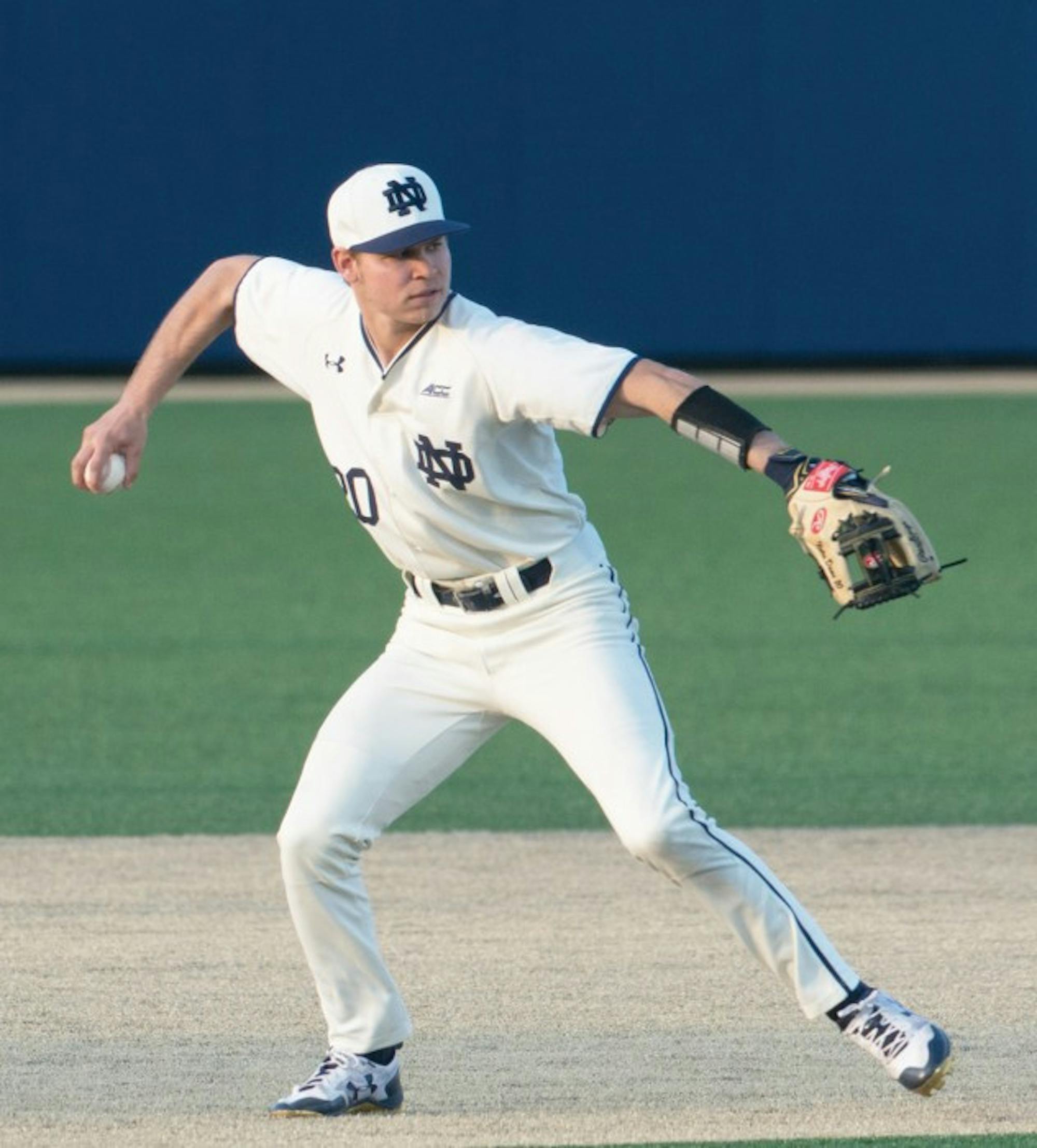 Senior third baseman Kyle Fiala throws to first base during Notre Dame’s 8-3 win over Toledo on April 12 at Frank Eck Stadium.