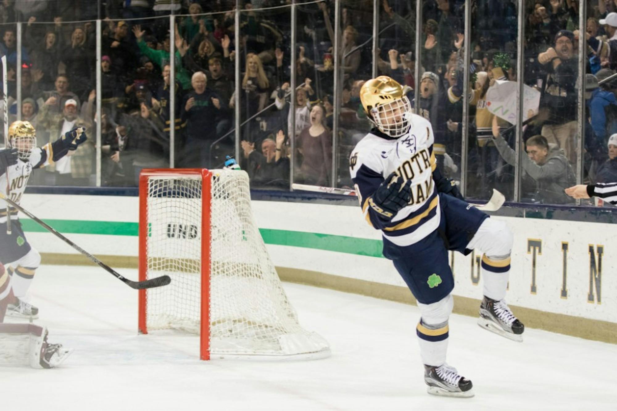 Irish junior forward Anders Bjork celebrates his game-winning goal in the second period of No. 14 Notre Dame's 3-2 upset of rival No. 4 Boston College at Compton Family Ice Arena on Saturday night.