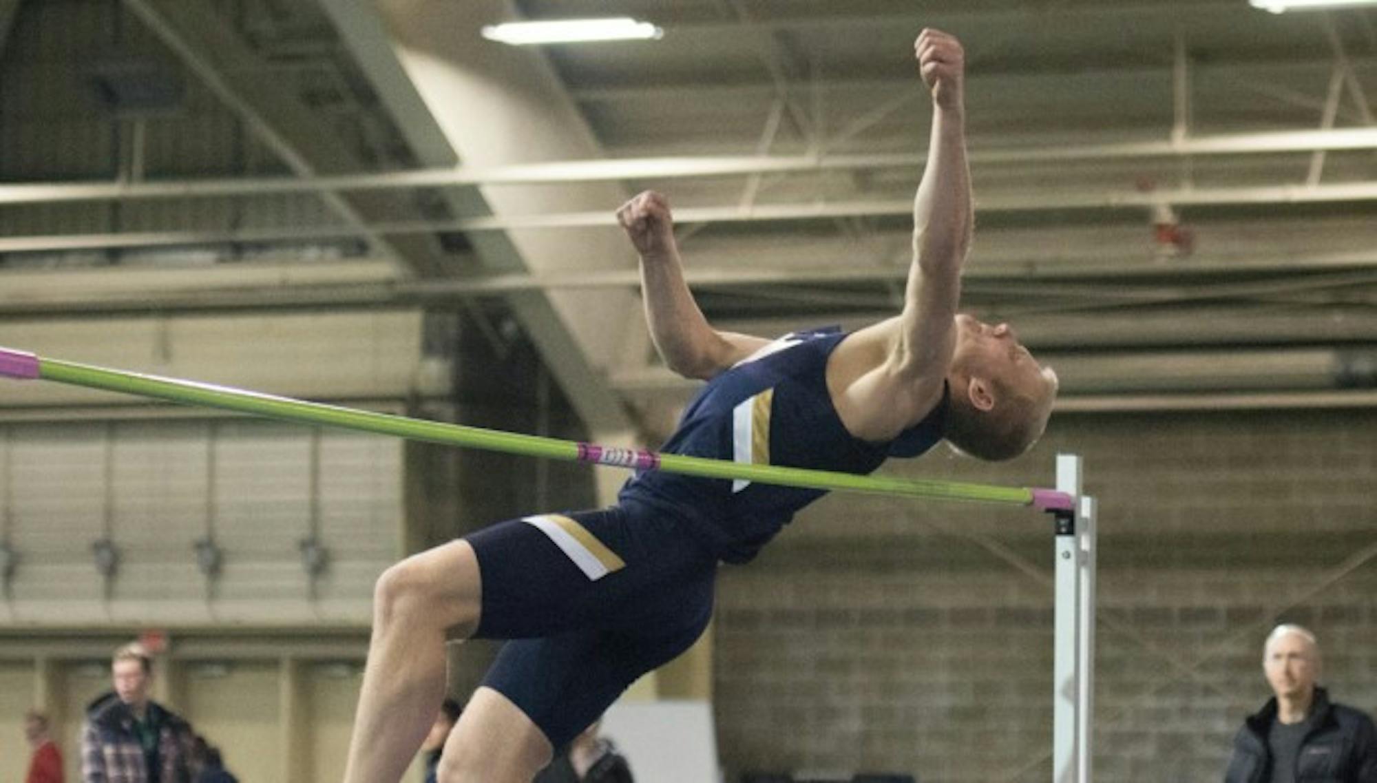 Freshman Hunter Holston vaults the high jump during the Blue-Gold Meet on Dec. 5, 2014 Holston would go on to win the event at Loftus Sports Center.