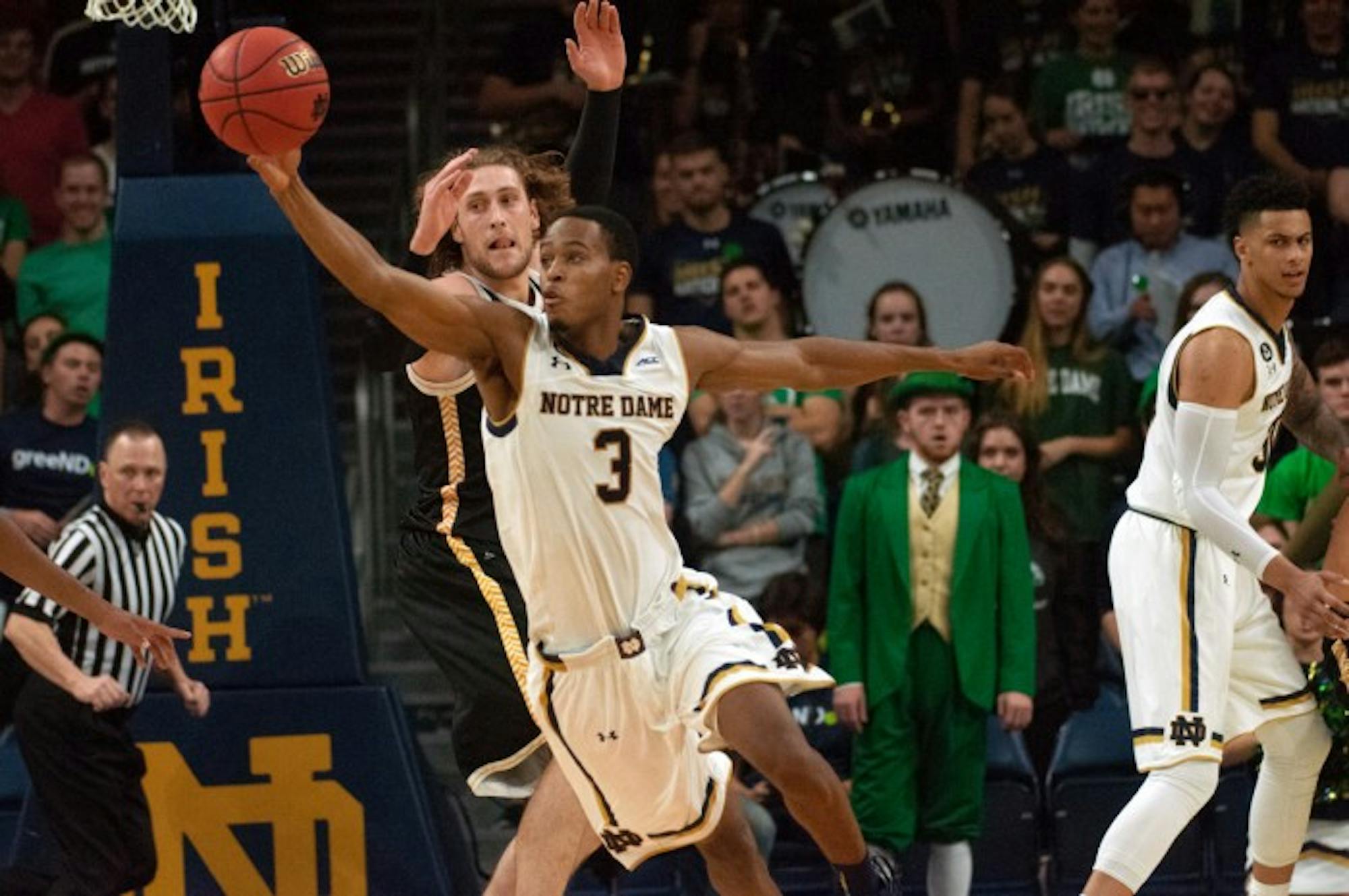 Irish junior forward V.J. Beachem fights for a loose ball during Notre Dame’s 86-78 victory over Milwaukee on Nov. 17 at Purcell Pavilion. The Irish return to action against Loyola Chicago on Sunday.