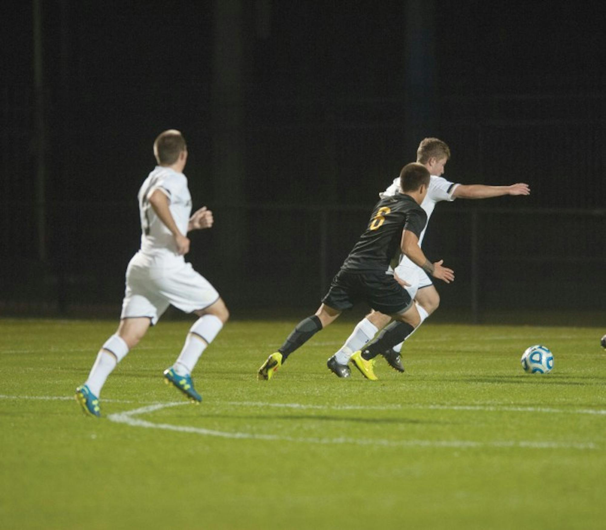 Irish freshman forward Jon Gallagher races towards the ball in a 1-0, double-overtime victory against VCU on Tuesday at Alumni Stadium. Gallagher recorded one shot in Friday’s loss to Boston College.