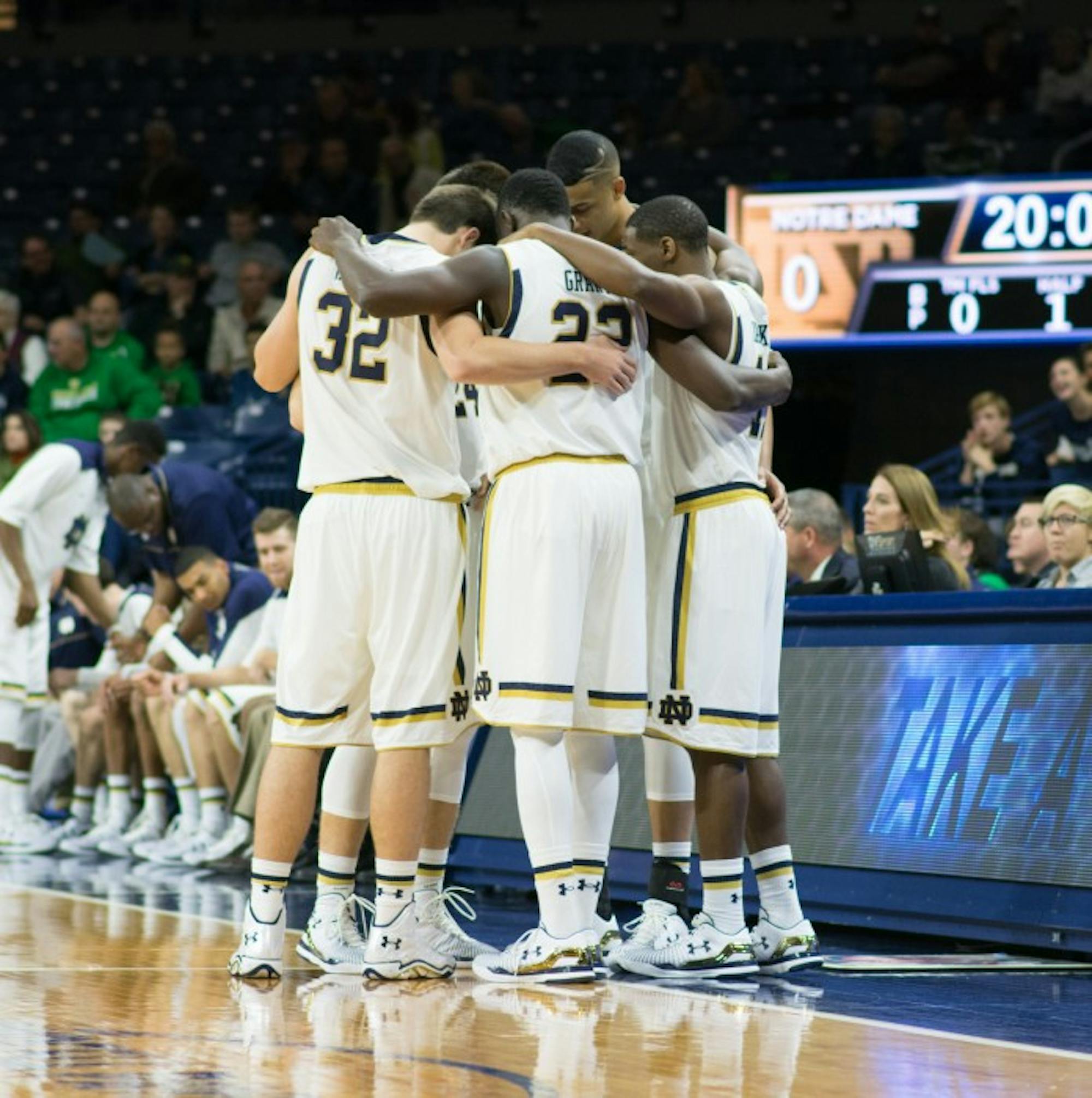 The Irish starting lineup gathers on the sideline before tip-off of its exhibition opener against Minnesota-Duluth on Nov. 1 at Purcell Pavilion.