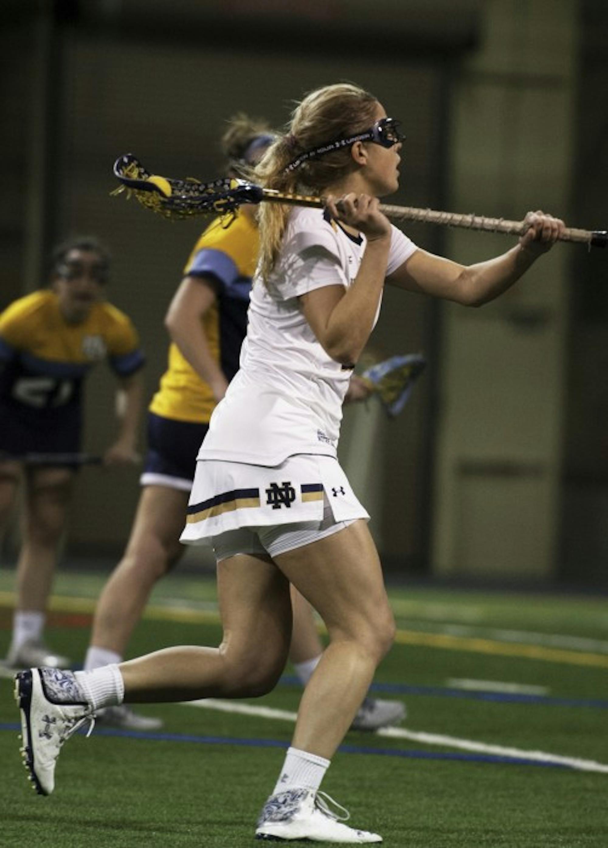 Irish senior attack Grace Muller looks to make a play during Notre Dame's 21-9 victory over Marquette on Feb. 14 at Loftus Sports Complex.
