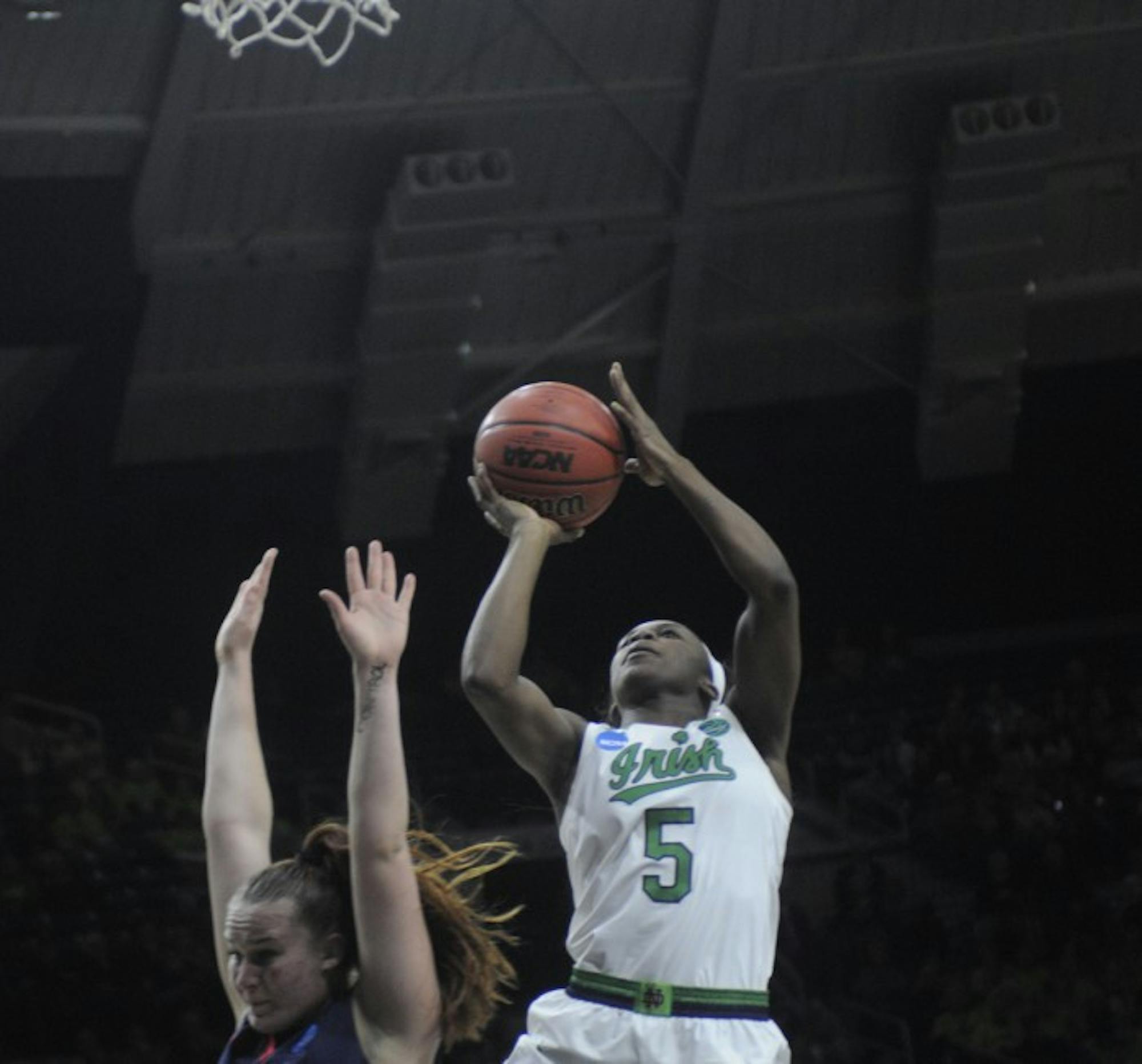 Irish freshman guard Jackie Young goes up for a layup during Notre Dame’s 79-49 win over Robert Morris on Friday at Purcell Pavilion.