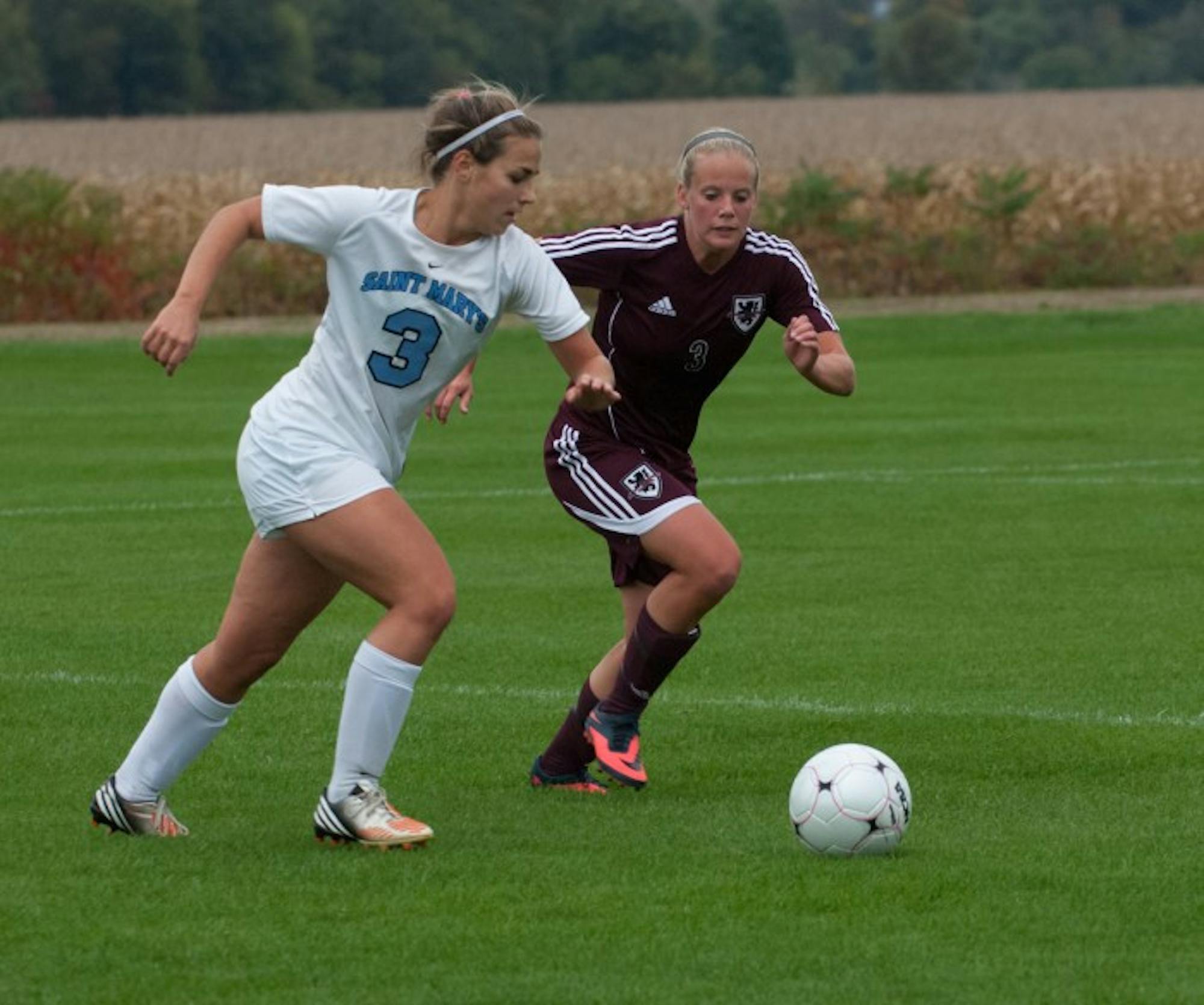 Belles junior defender Lindsay Rzepecki dribbles past an opponent during a 1-0 home loss against Alma on Oct. 16.