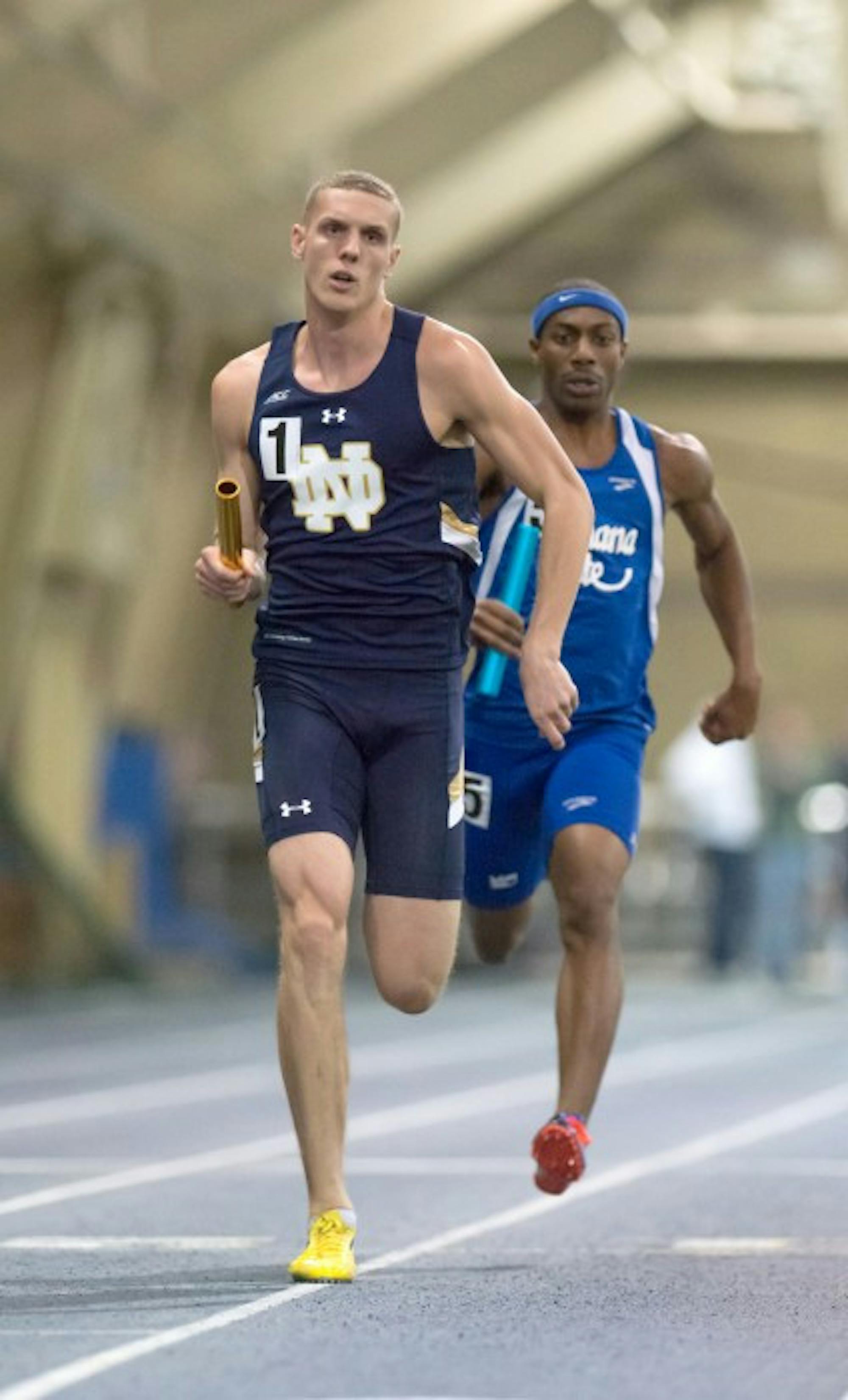Irish senior Chris Giesting runs a leg of a relay during the Notre Dame Invitational at Loftus Sports Center on Jan. 24.