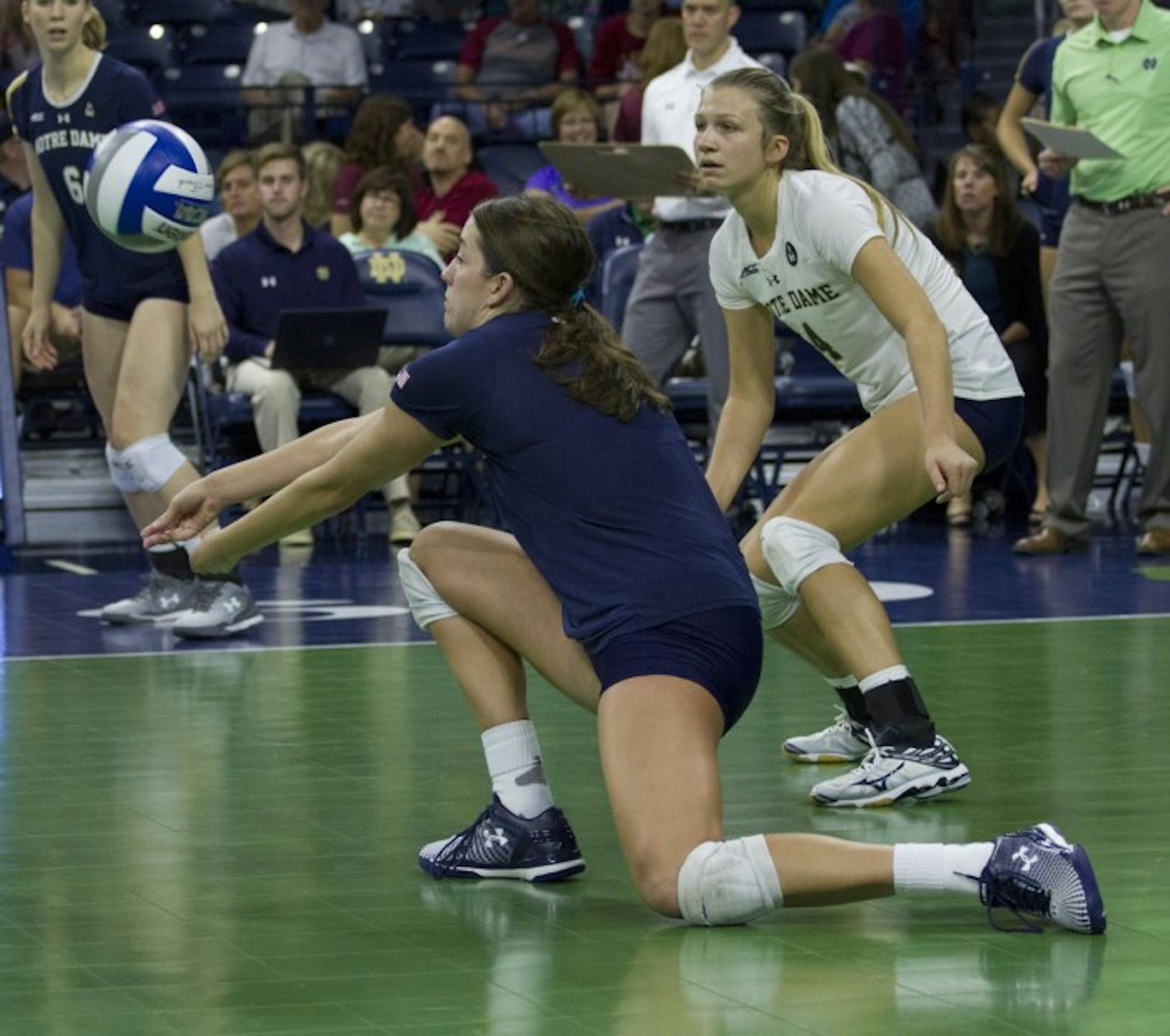 Sophomore outside hitter Sydney Kuhn digs a ball during Notre Dame’s 3-0 loss against Florida State on Sunday afternoon.