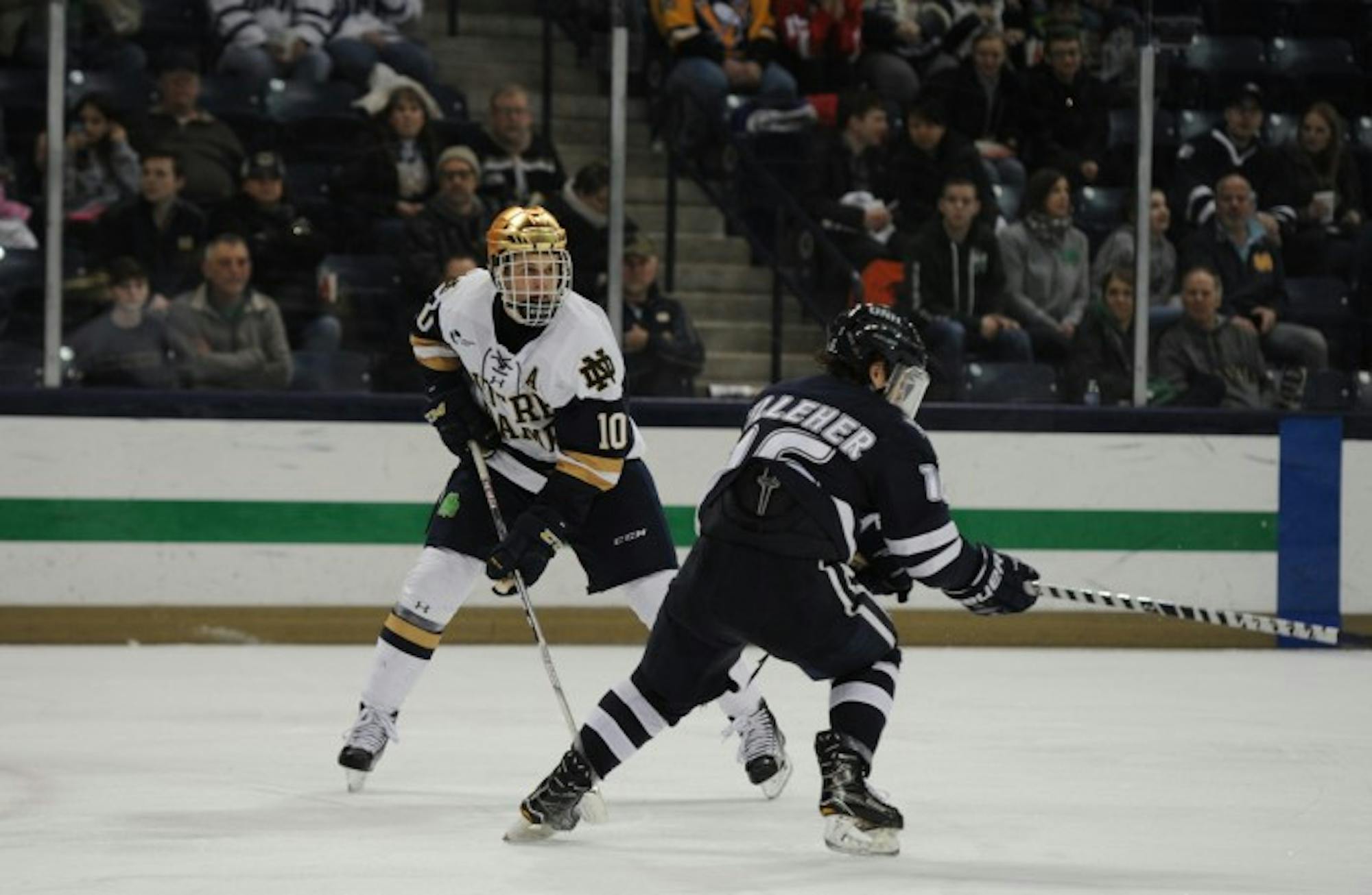 Irish junior forward Anders Bjork surveys the ice during Notre Dame’s 2-2 overtime tie with New Hampshire on Jan. 20.