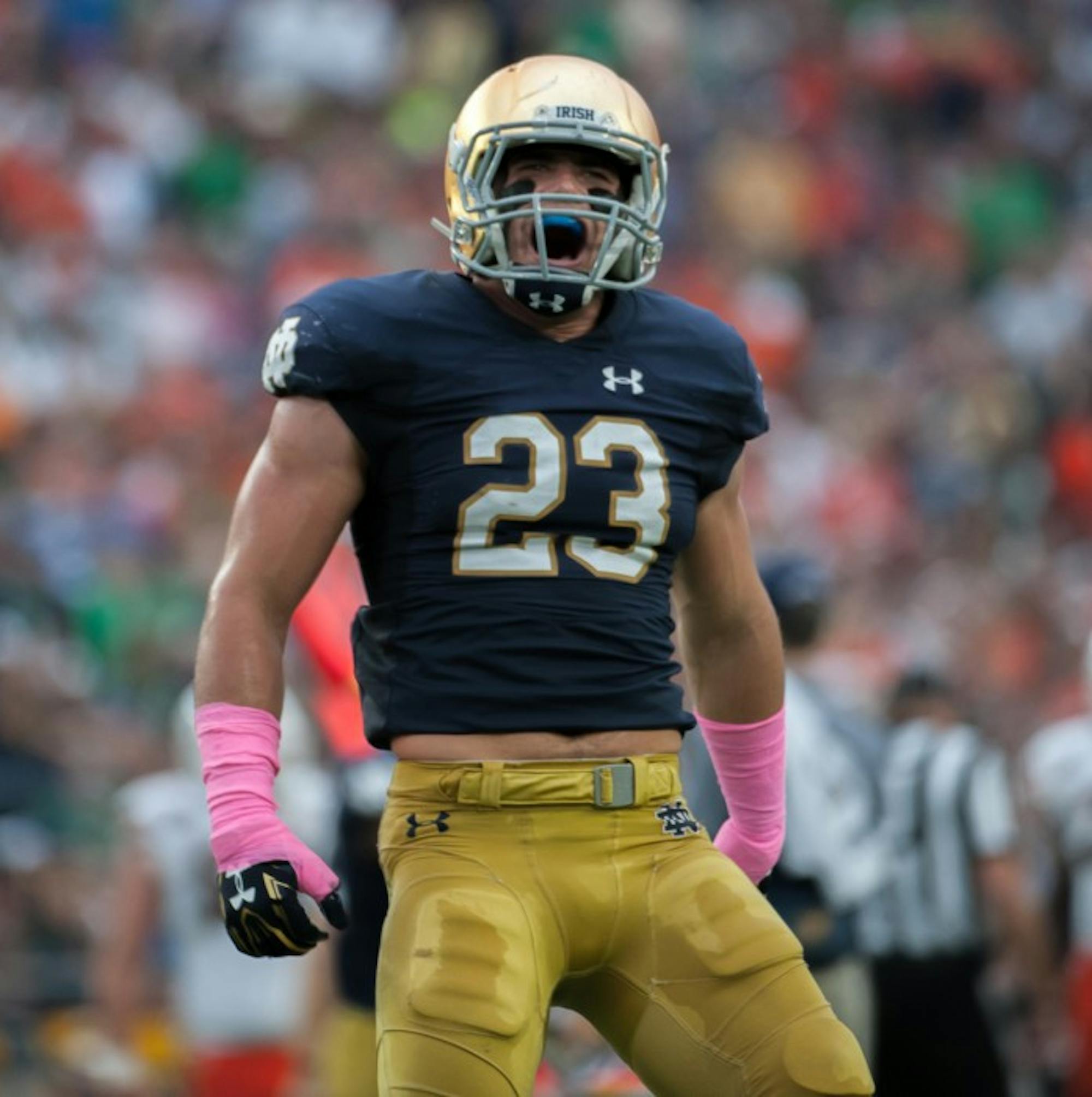 Senior Drue Tranquill celebrates after a defensive stop during Notre Dame’s victory over the Hurricanes on Oct. 29, 2016.
