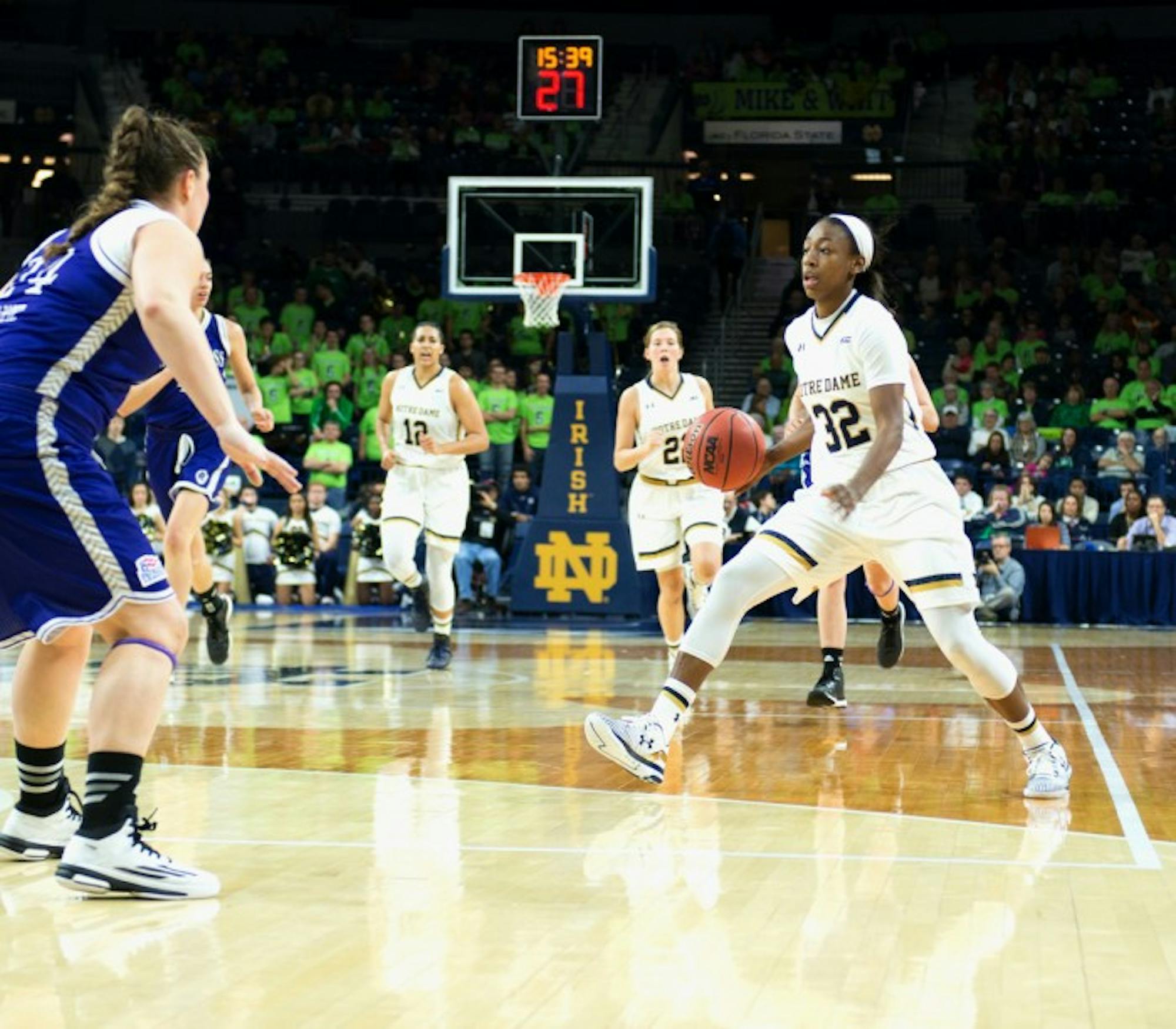 Irish junior guard Jewell Loyd dribbles during Notre Dame’s win over Holy Cross on Nov 23. Loyd scored 27 points against Maryland.