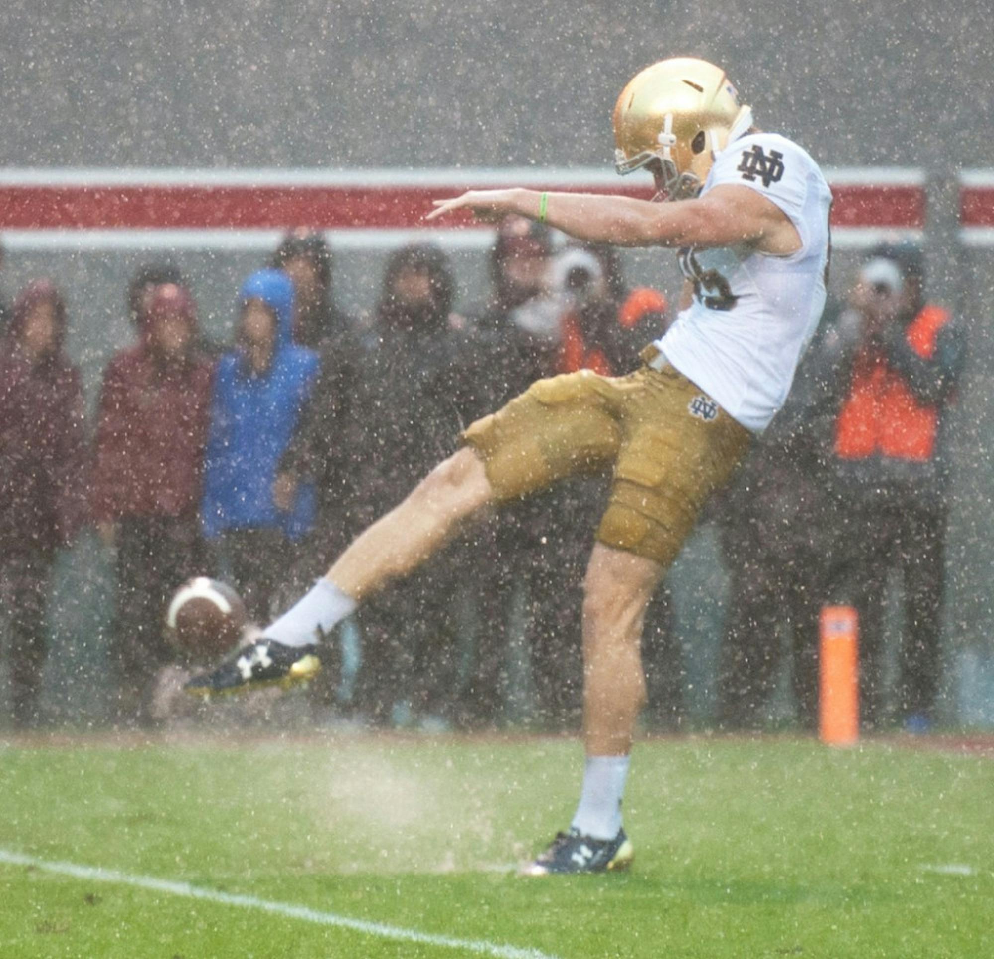 Irish junior punter Tyler Newsome gets off a punt during Saturday’s game. N.C. State returned a blocked punt for a touchdown late to win.