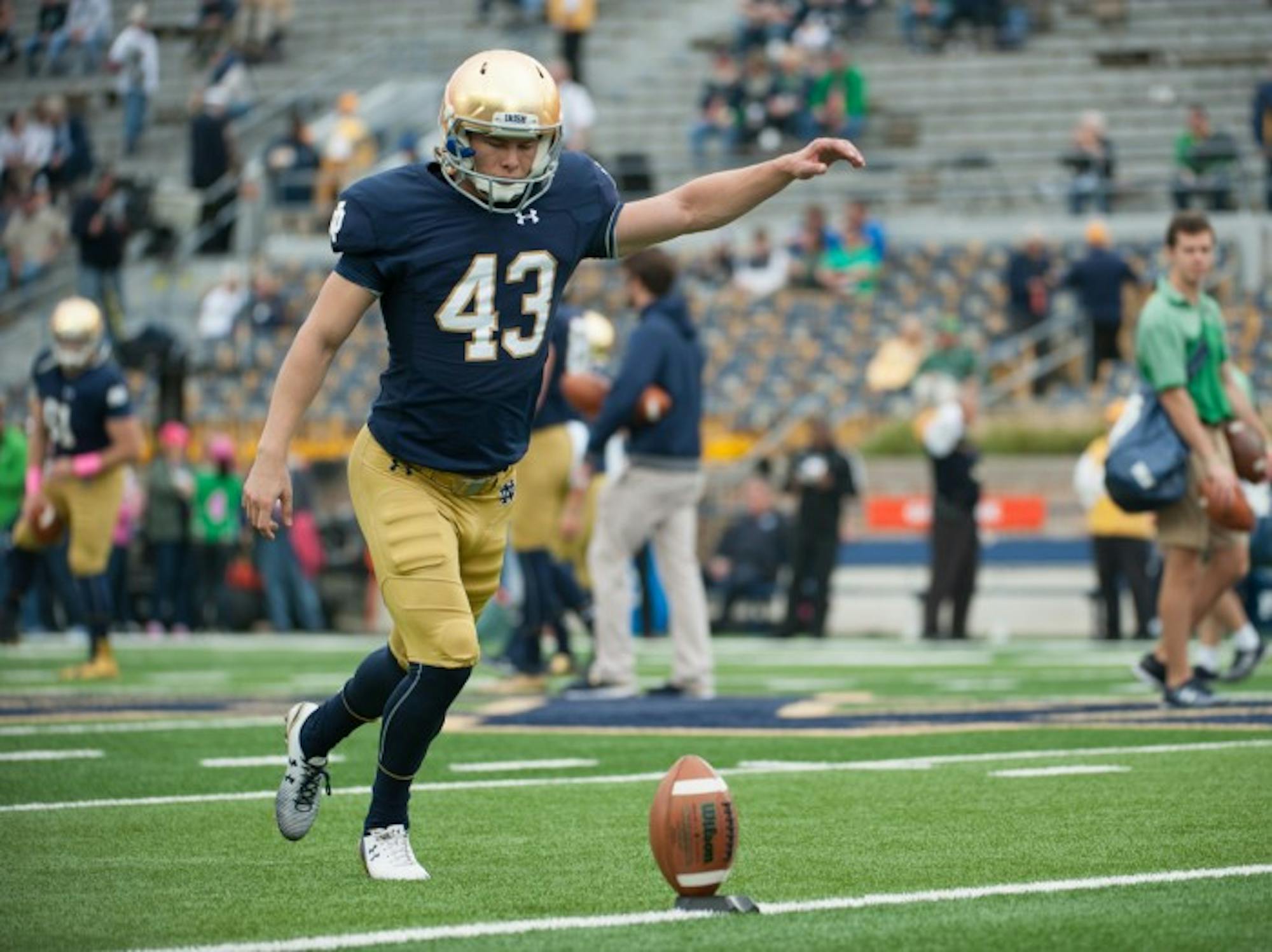 Irish senior kicker John Chereson practices before Notre Dame’s victory over Miami on Oct. 29 at Notre Dame Stadium. Chereson kicked off three times in the game, including one that went for a touchback.