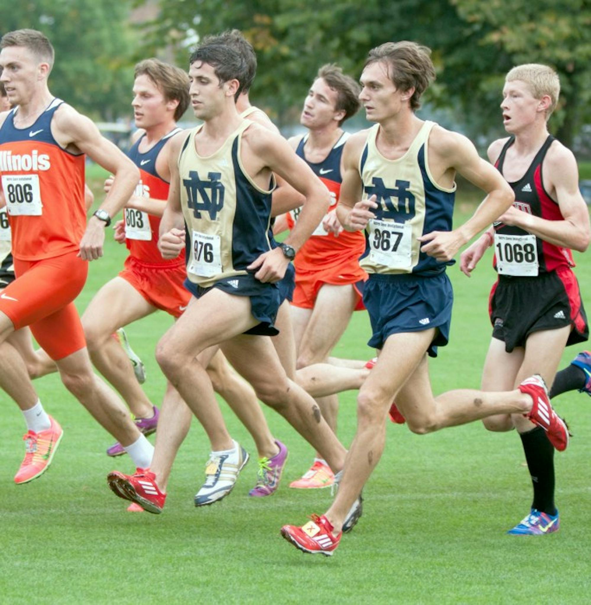 Irish junior Michael Clevenger, on the right, keeps up with graduated J.P. Malette, during the Notre Dame Invitational at Notre Dame Golf Course on Oct. 4.