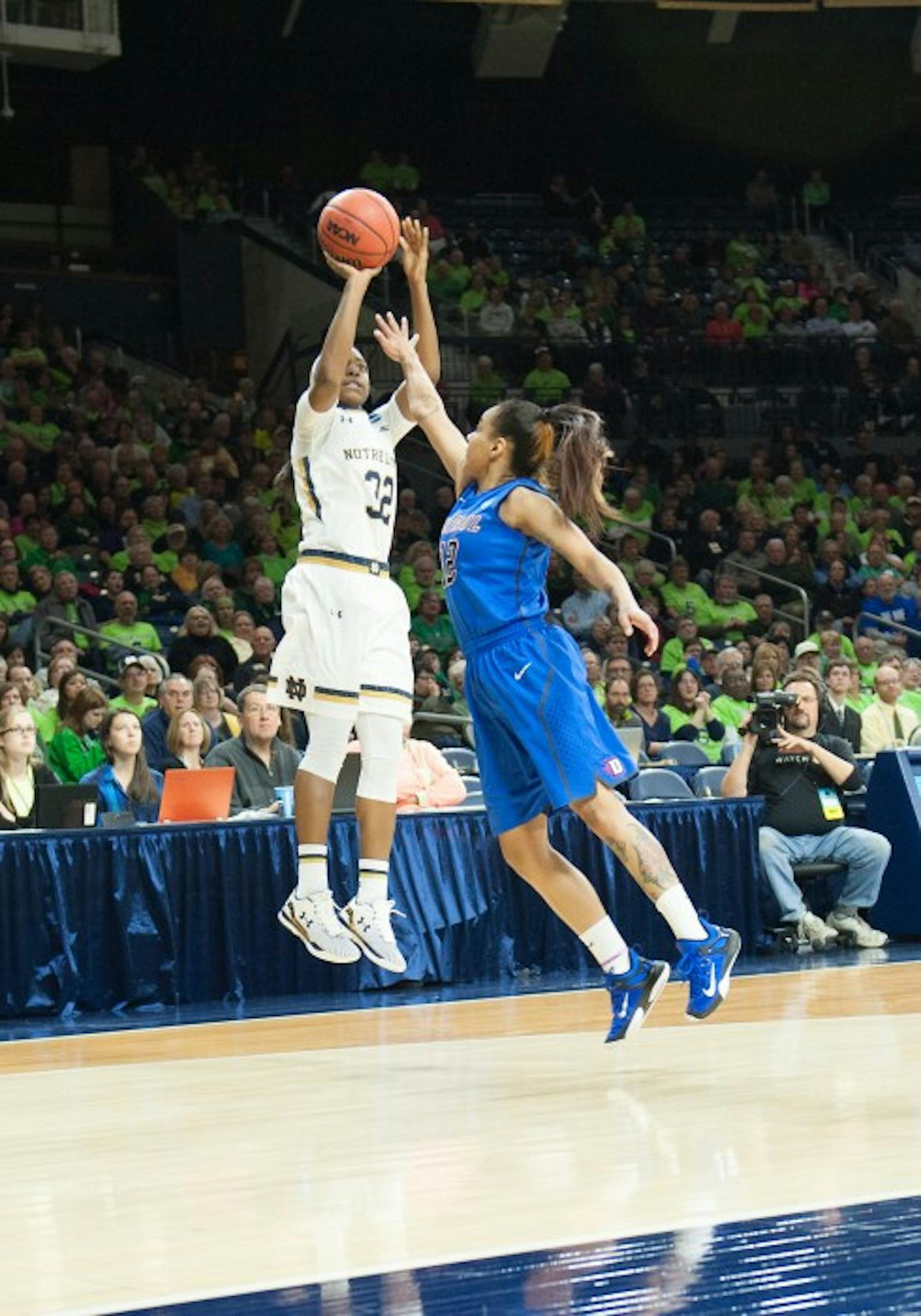 Junior guard Jewell Loyd attempts a three-pointer during Sunday night’s win against DePaul in the  second round of the NCAA tournament. Loyd had ten points in the 79-62 victory at Purcell Pavilion.
