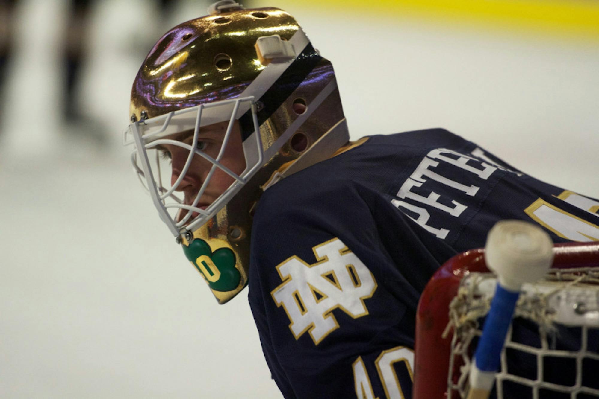 Irish junior goaltender Cal Peterson stands in the net during Notre Dame’s 6-1 loss to Denver on Thursday at the United Center in Chicago. Peterson had 36 saves in the game, which ended Notre Dame’s season.