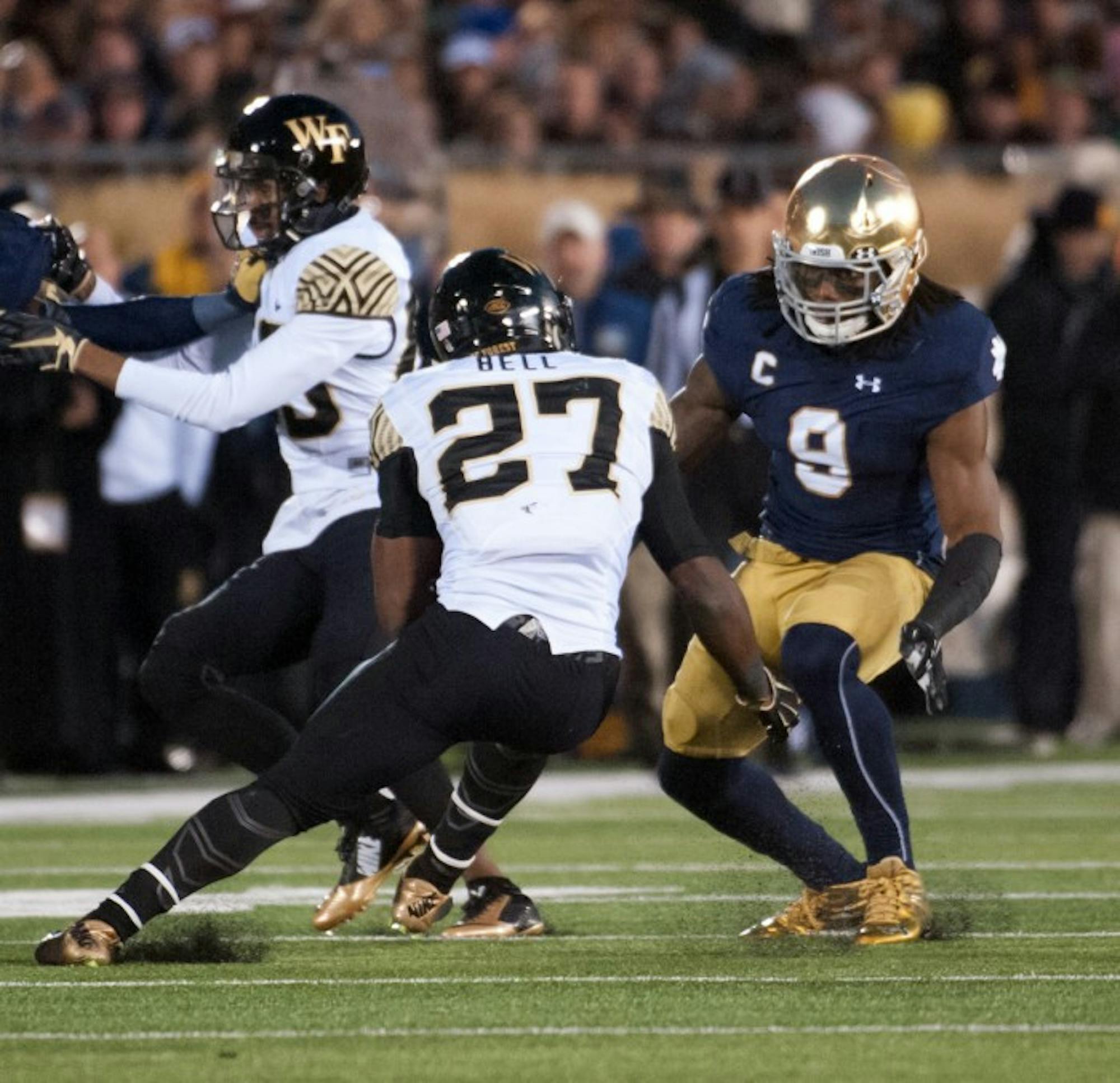 Former Irish linebacker Jaylon Smith attempts to tackle Wake Forest running back during Notre Dame's victory over the Demon Deacons on at Notre Dame Stadium.