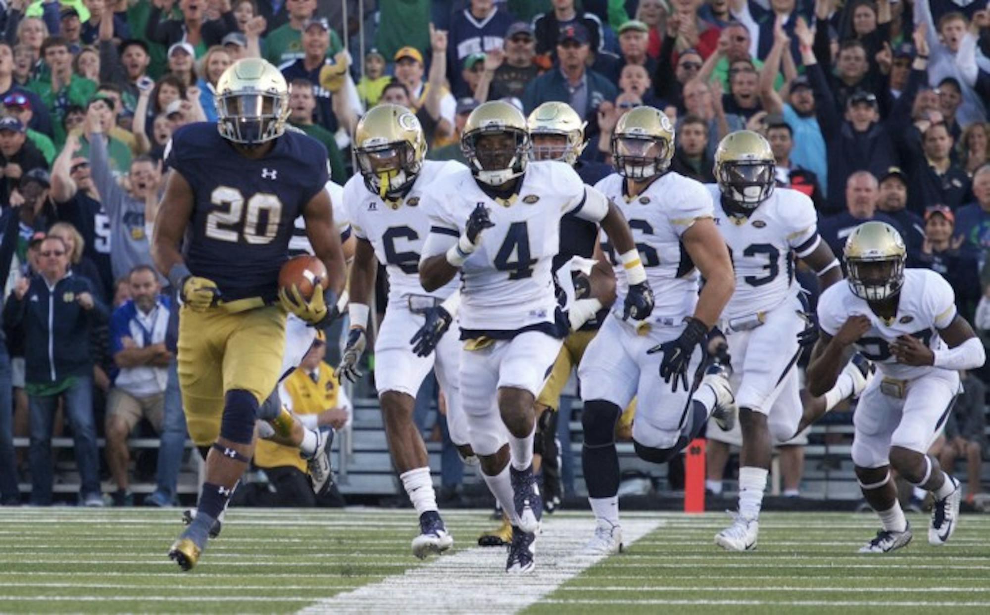 Irish senior running back C.J. Prosise leaves the Georgia Tech defense in his wake during his 91-yard, fourth-quarter touchdown run in Notre Dame’s 30-22 win Saturday. The touchdown run, Prosise’s third of the game, was the longest in Notre Dame Stadium history, and pushed him over 200 multipurpose yards for the contest.