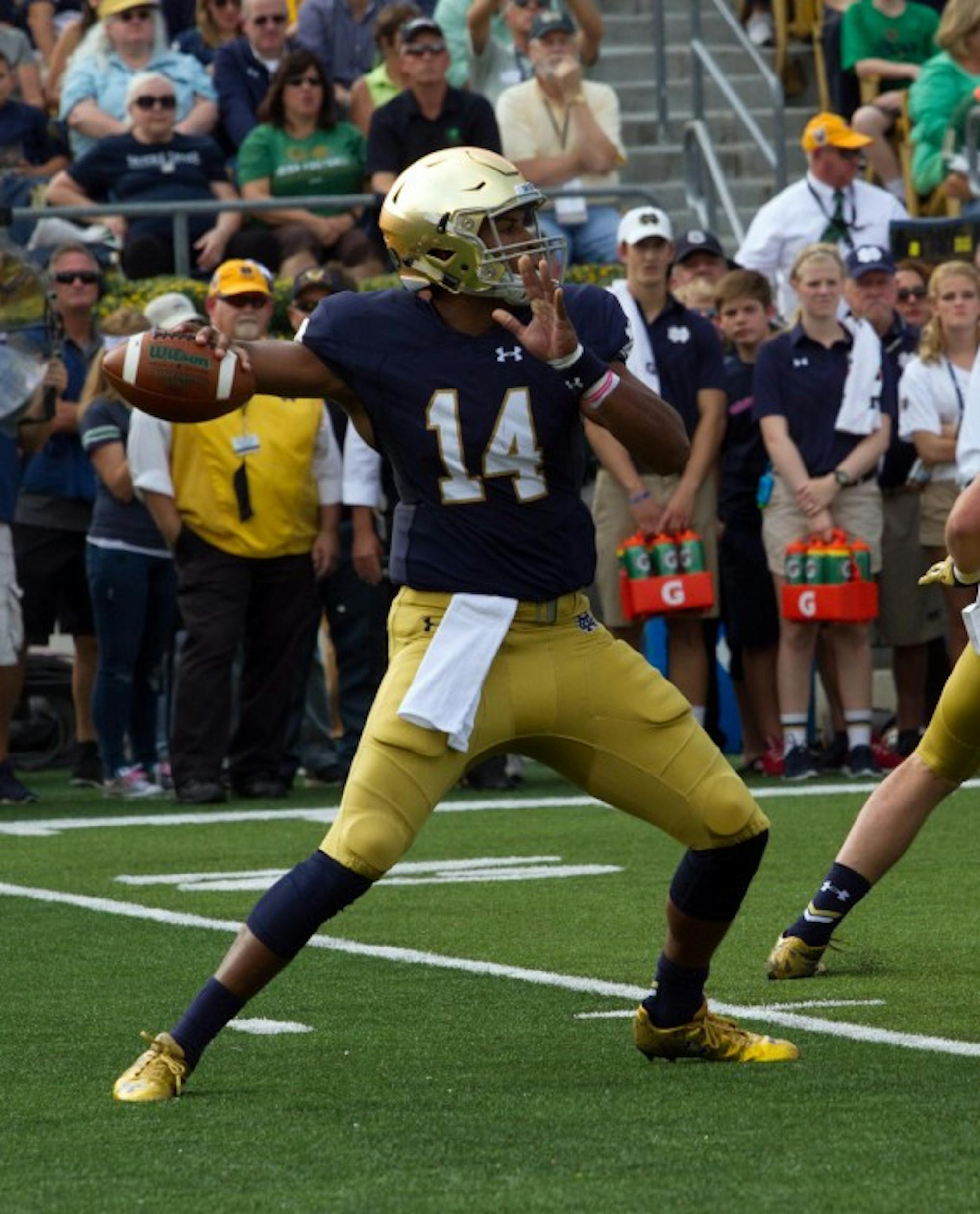 Irish sophomore quarterback DeShone Kizer winds up to throw during Notre Dame's 62-27 win over Massachusetts on Saturday at Notre Dame Stadium.
