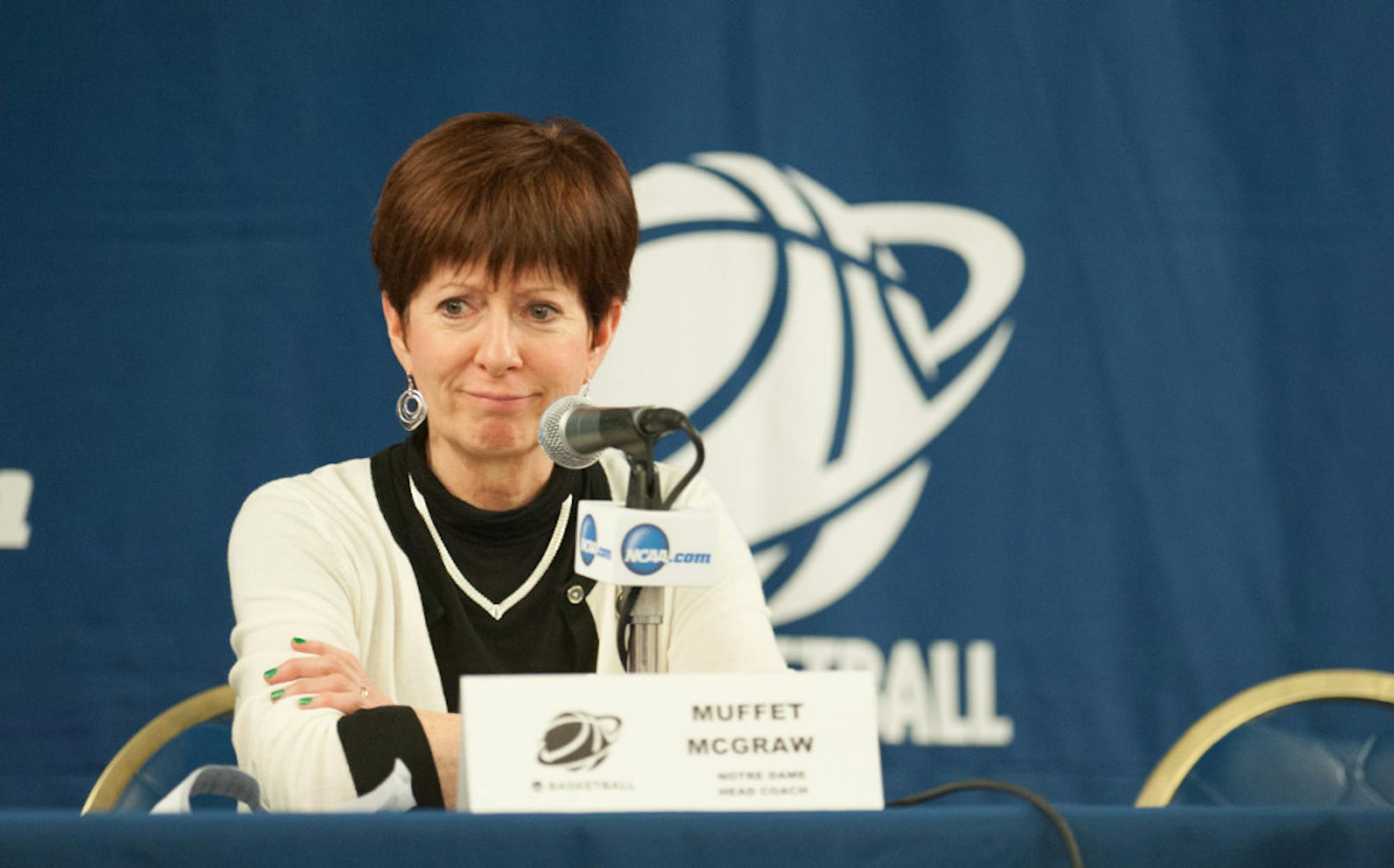 Muffet McGraw smirks during her post-game press conference after Notre Dame defeated Montana 77-43 in the first round of the NCAA tournament at Purcell Pavilion on March 20, 2015.