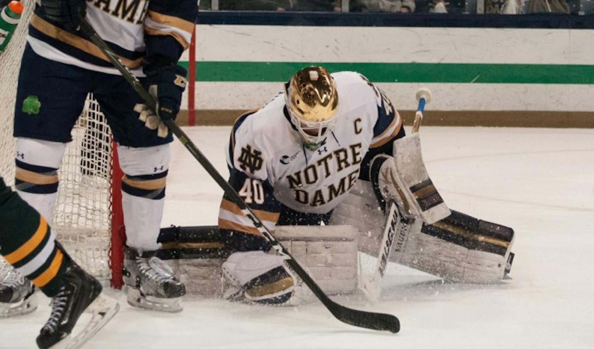 Irish junior goalkeeper makes a save during Notre Dame's 4-1 victory against Vermont on Feb. 4 at Compton Family Ice Arena.